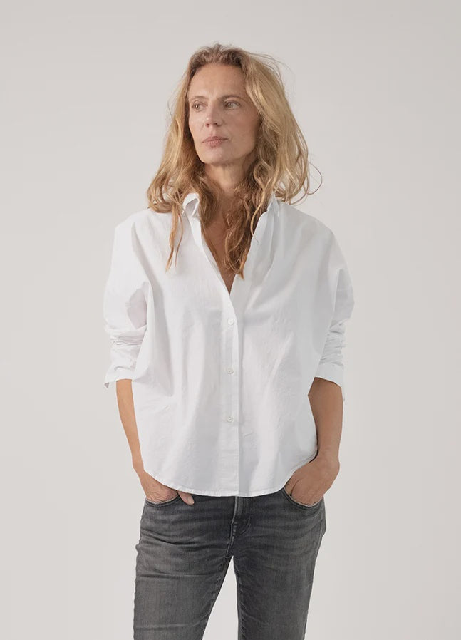 Monday12 Zoe Shirt in soft fabric paired with jeans, styled casually with hands in pockets, Bungalow Furniture &amp; Accessories.