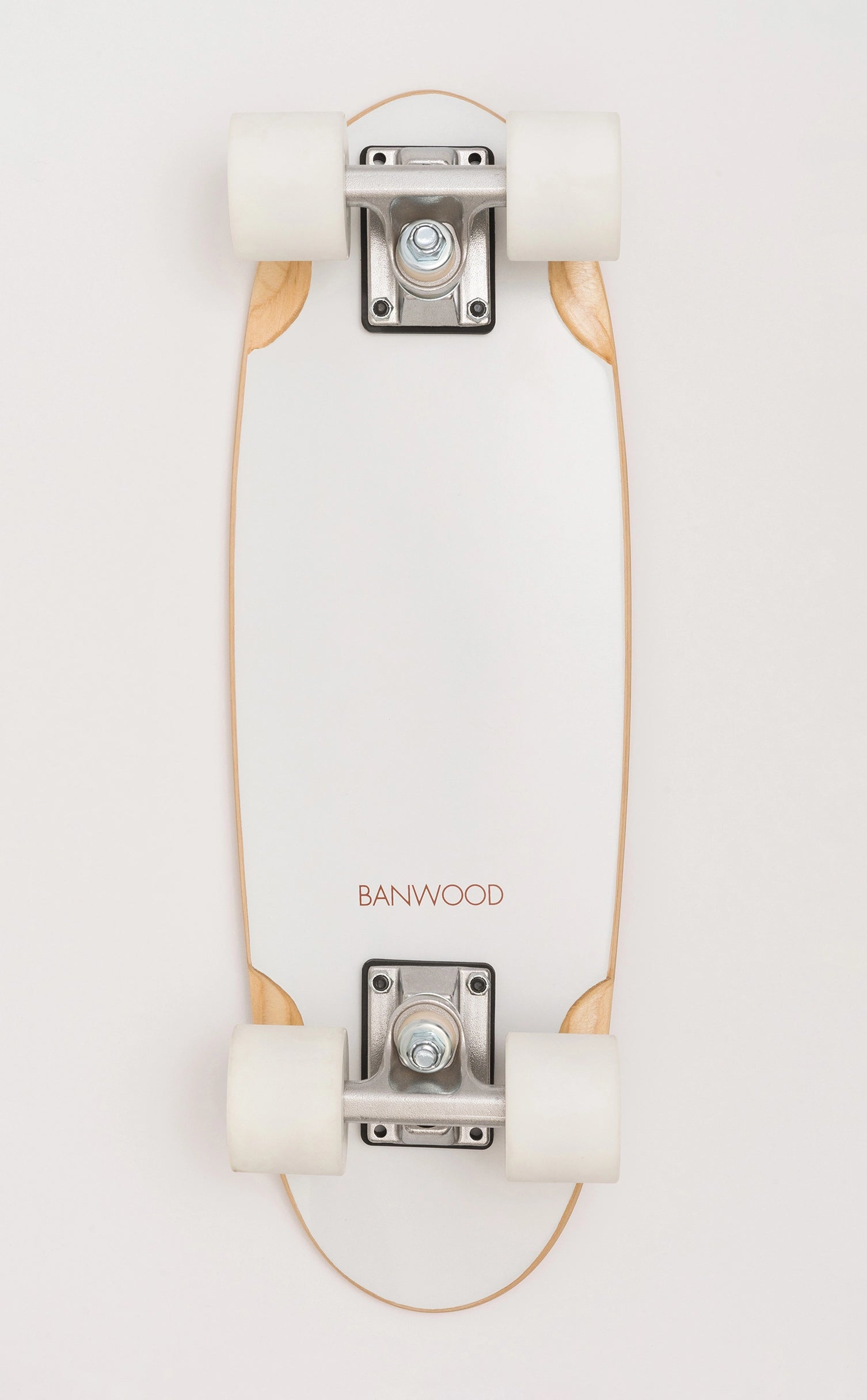 A white Faire Vintage Skateboard cruiser with natural wood edges, a Canadian maple deck, white wheels, and silver trucks is seen from above on a white background. The brand name "FAIRE" appears near one end.