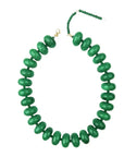The Faire Bailey Chunky Beaded Necklace showcases large, glossy green marbled beads and an adjustable gold-tone clasp with chain extension, elegantly presented on a white background.
