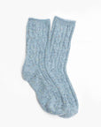 Faire Wool Speckled Knit Socks—light blue ribbed wool-blend socks with subtle multicolored speckles—shown flat on a white background.