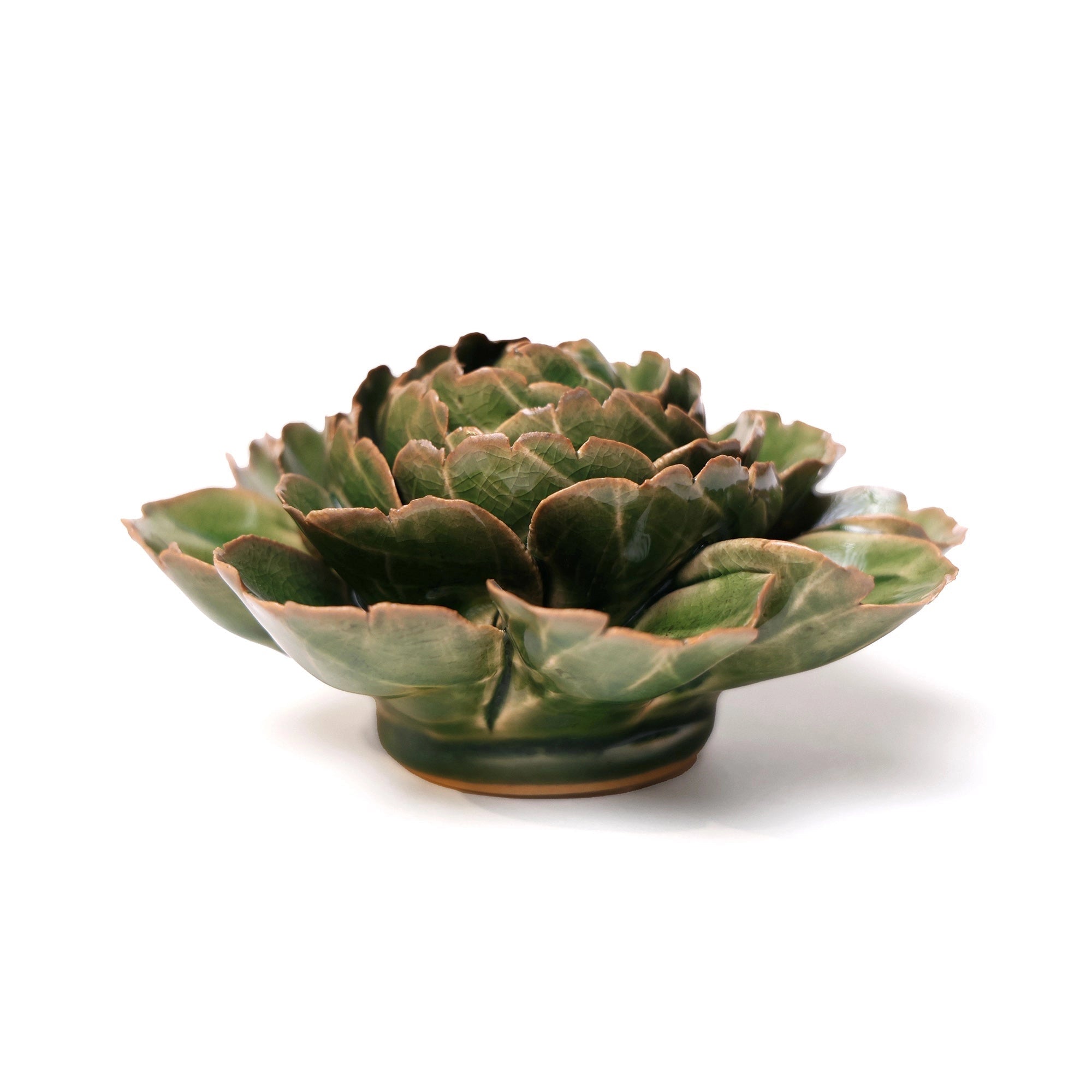 The Avocado Green Rozella Peony by Chive Ceramics (thru Faire) is a ceramic sculpture with layered, textured leaves in emerald green and subtle brown edges—an elegant decor piece displayed on a white background.