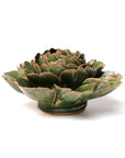 The Avocado Green Rozella Peony by Chive Ceramics (thru Faire) is a ceramic sculpture with layered, textured leaves in emerald green and subtle brown edges—an elegant decor piece displayed on a white background.