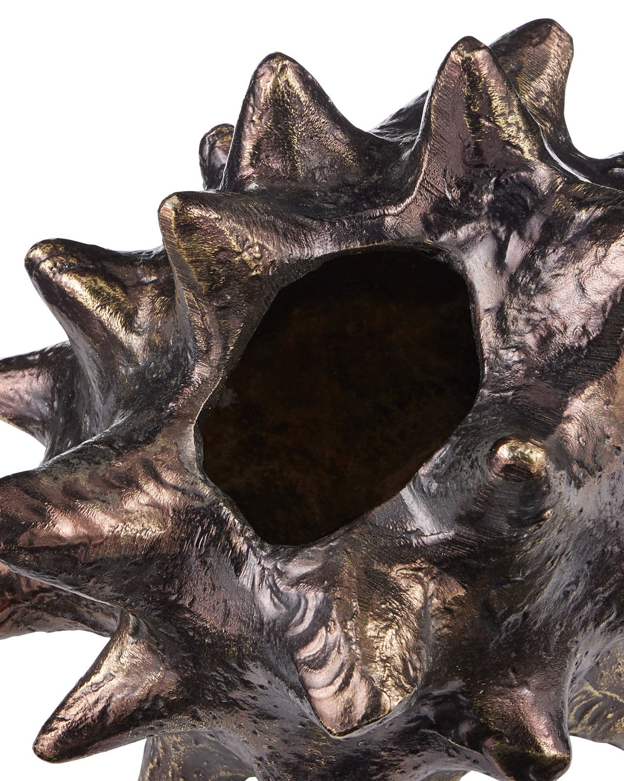 Close-up of the Jacks Object by Currey & Company, Inc.—a spiky decorative piece featuring a hollow center and a dark surface with bronze and gold highlights, giving it a rugged, antique brass-like appearance.