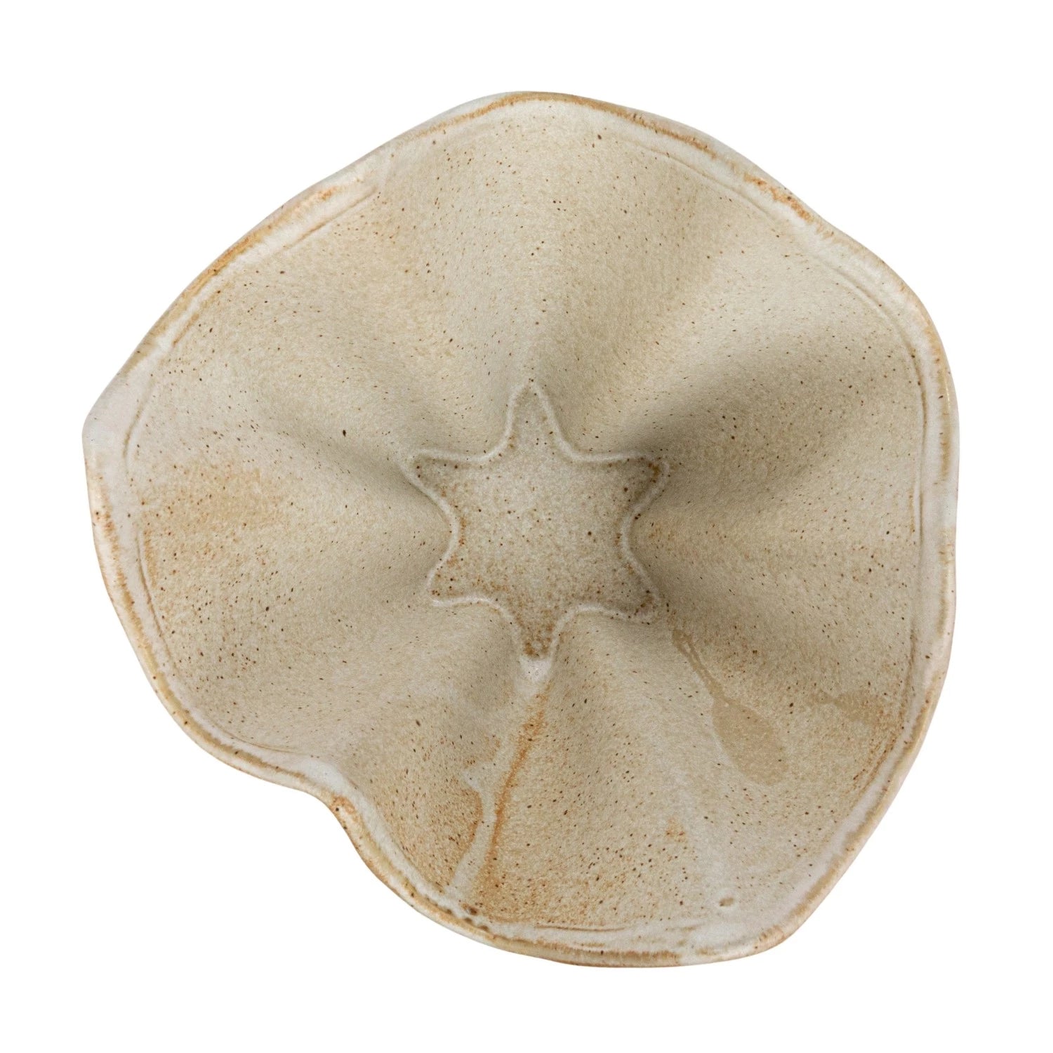 The Bloomingville Ruffled Stoneware Bowl features a cream finish, uneven organic shape, star-like center indentation, and a reactive glaze with light brown speckles for a rustic handmade look.