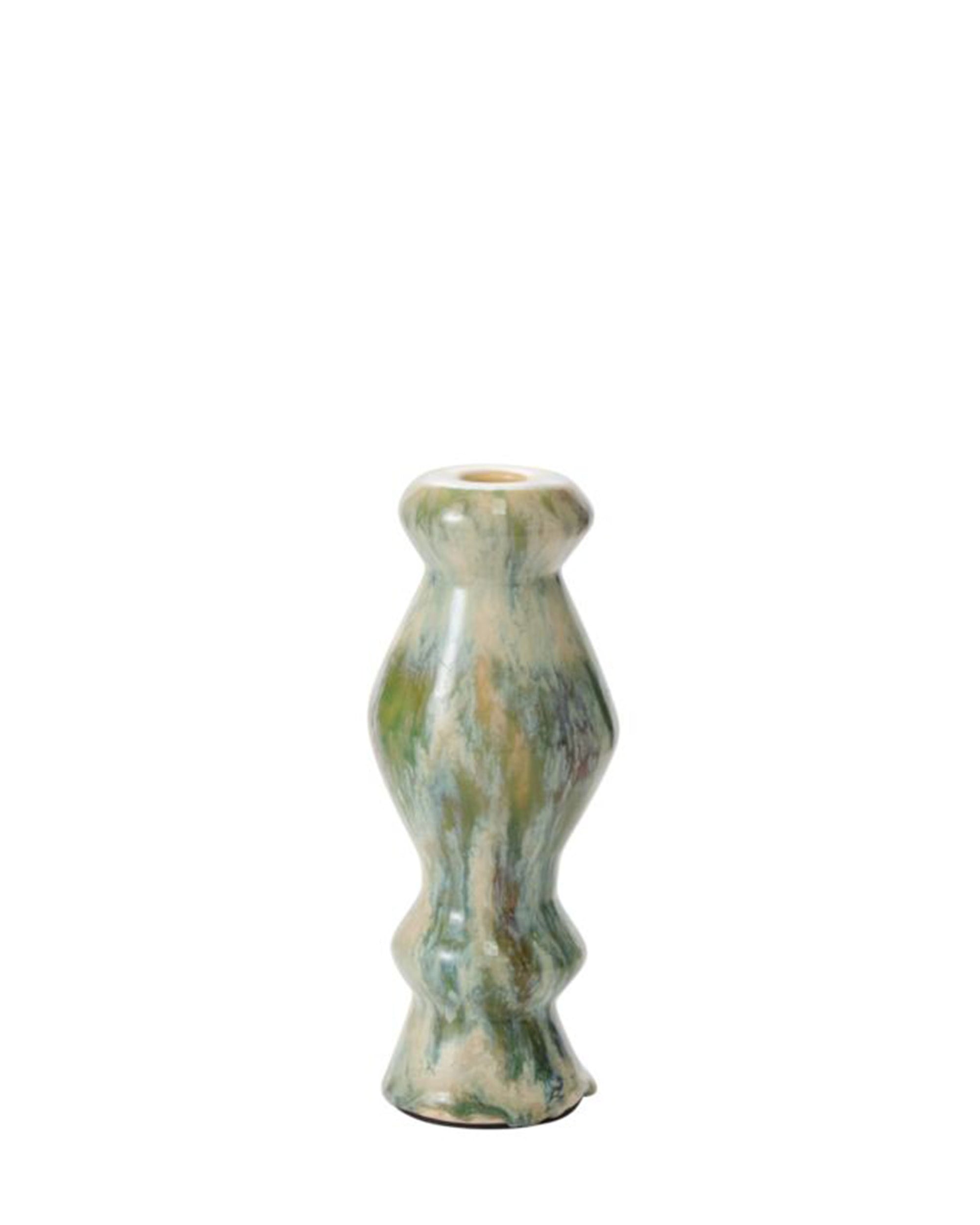 The Ailey Candleholder 3"x8" by Accent Decor features a tall, narrow design with a wavy sculpted shape and marbled green and beige finish, displayed against a plain white background.