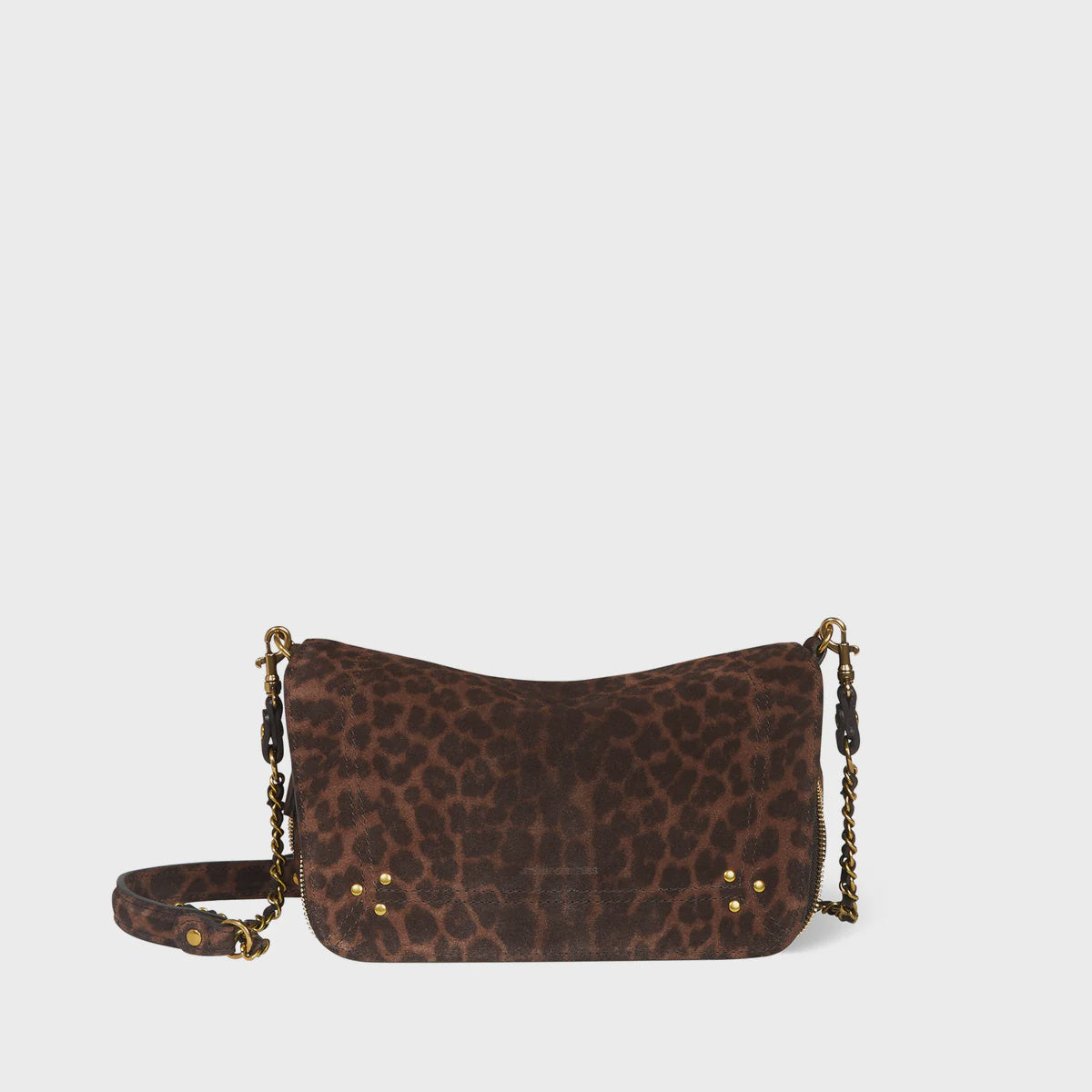 The Bobi Small Bag by Jerome Dreyfuss is a brown leopard print shoulder bag featuring a braided leather chain strap and small gold rivets, set against a plain white background.