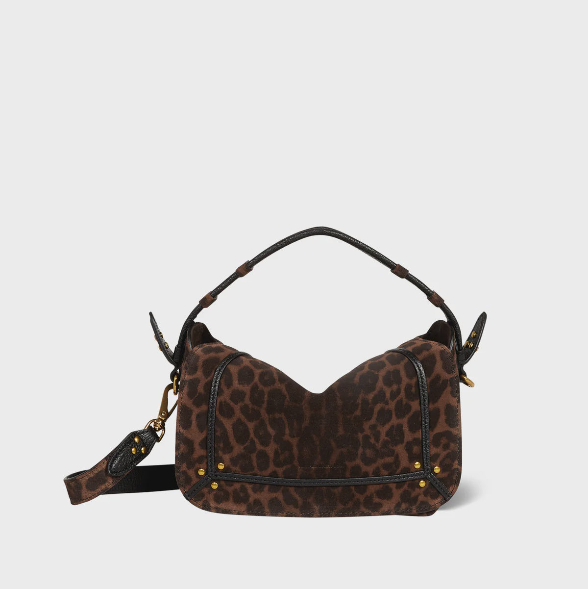 The Pepito Small Bag by Jerome Dreyfuss is a stylish brown leopard print shoulder bag with a quilted leather handle and adjustable strap. It boasts gold-tone hardware and side flap details, set against a plain white background.