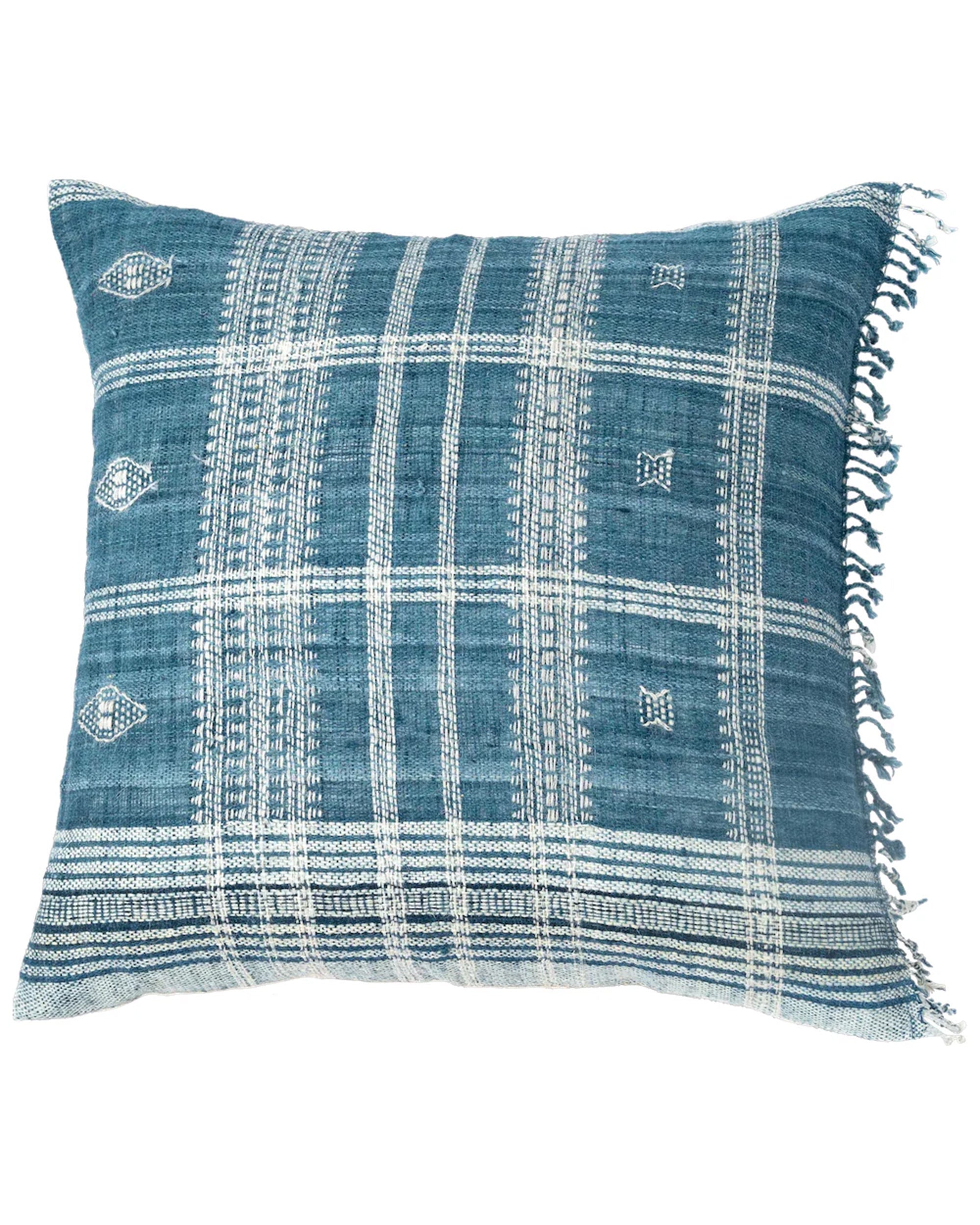 The Akriti Indigo Pillow 24x24 by Filling Spaces LLC is a square blue and white plaid hand-loomed pillow with a woven geometric pattern and fringe on one edge, displayed against a white background.