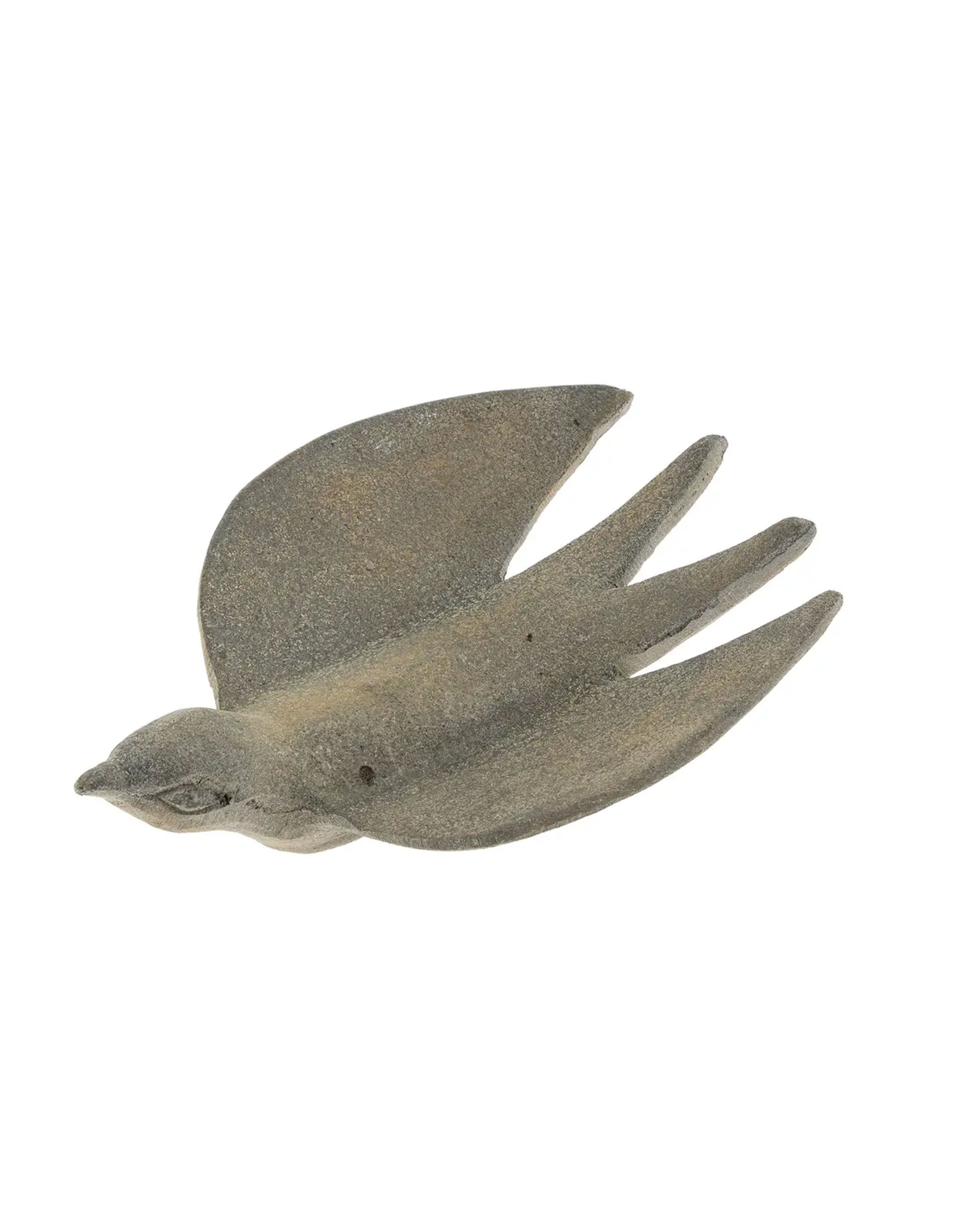 The Deco Metal Bird by Indaba features a gray, minimalist aluminum design with outstretched wings—perfect for adding rustic fall decor to any crisp white backdrop.