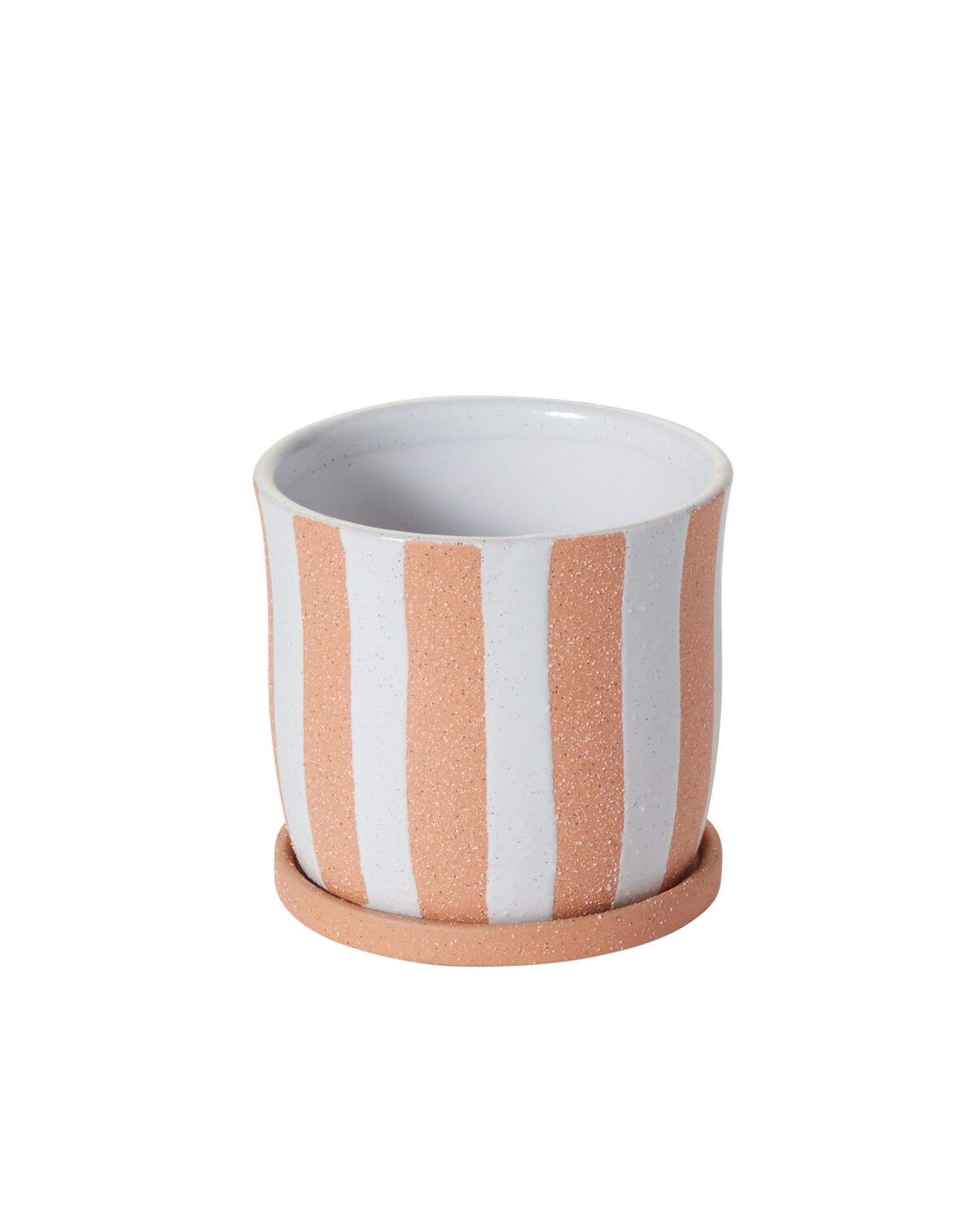 The Accent Decor 50550 Andreas Pot with Saucer S is a small ceramic planter with vertical peach and white stripes, a slightly flared rim, smooth speckled texture, and a drainage hole for healthy plants.