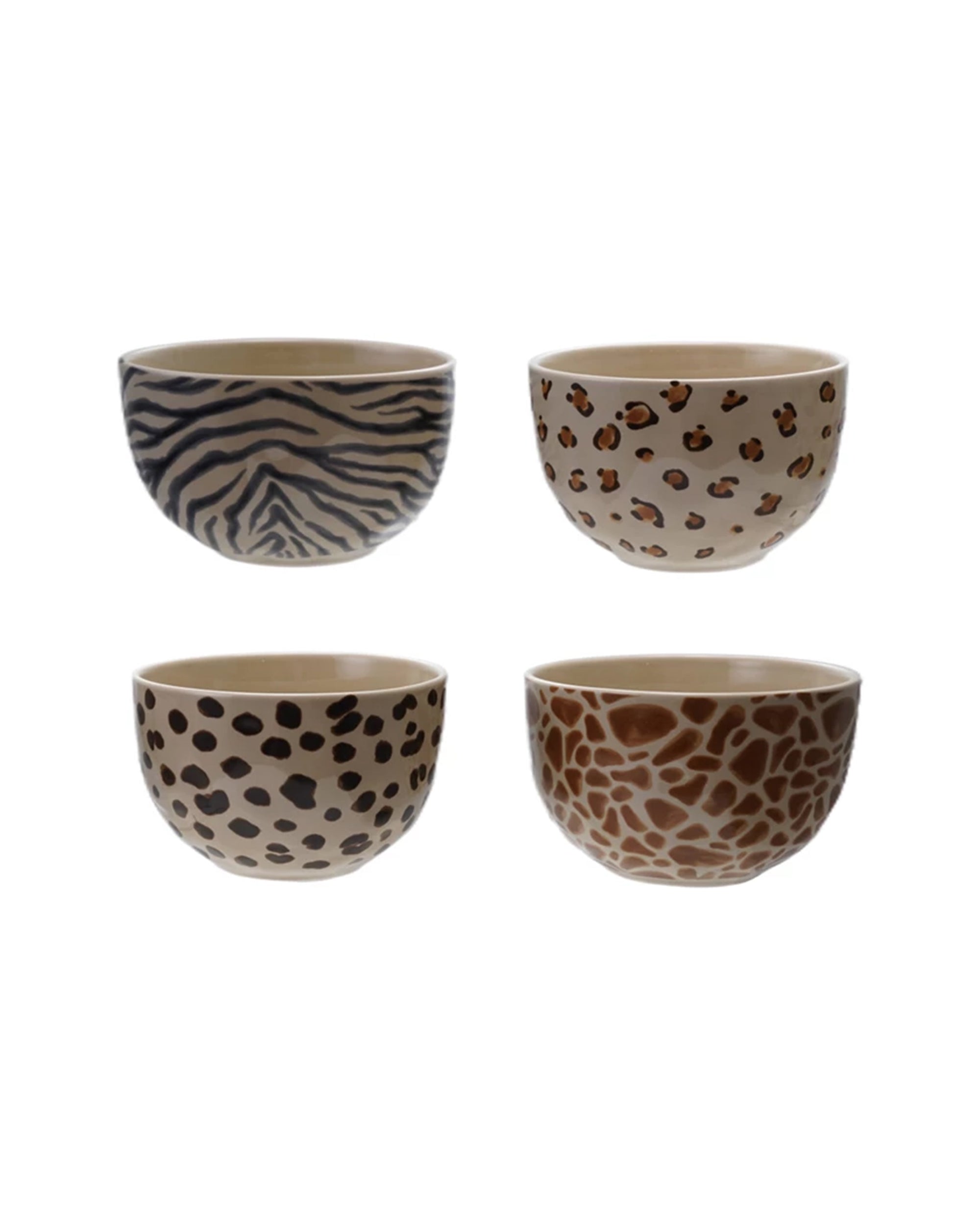 The Creative Co-op Bowl with Animal Print set includes four compact stoneware dishes—zebra, leopard, cheetah, and giraffe patterns—arranged in a 2x2 grid; perfect for serving appetizers.