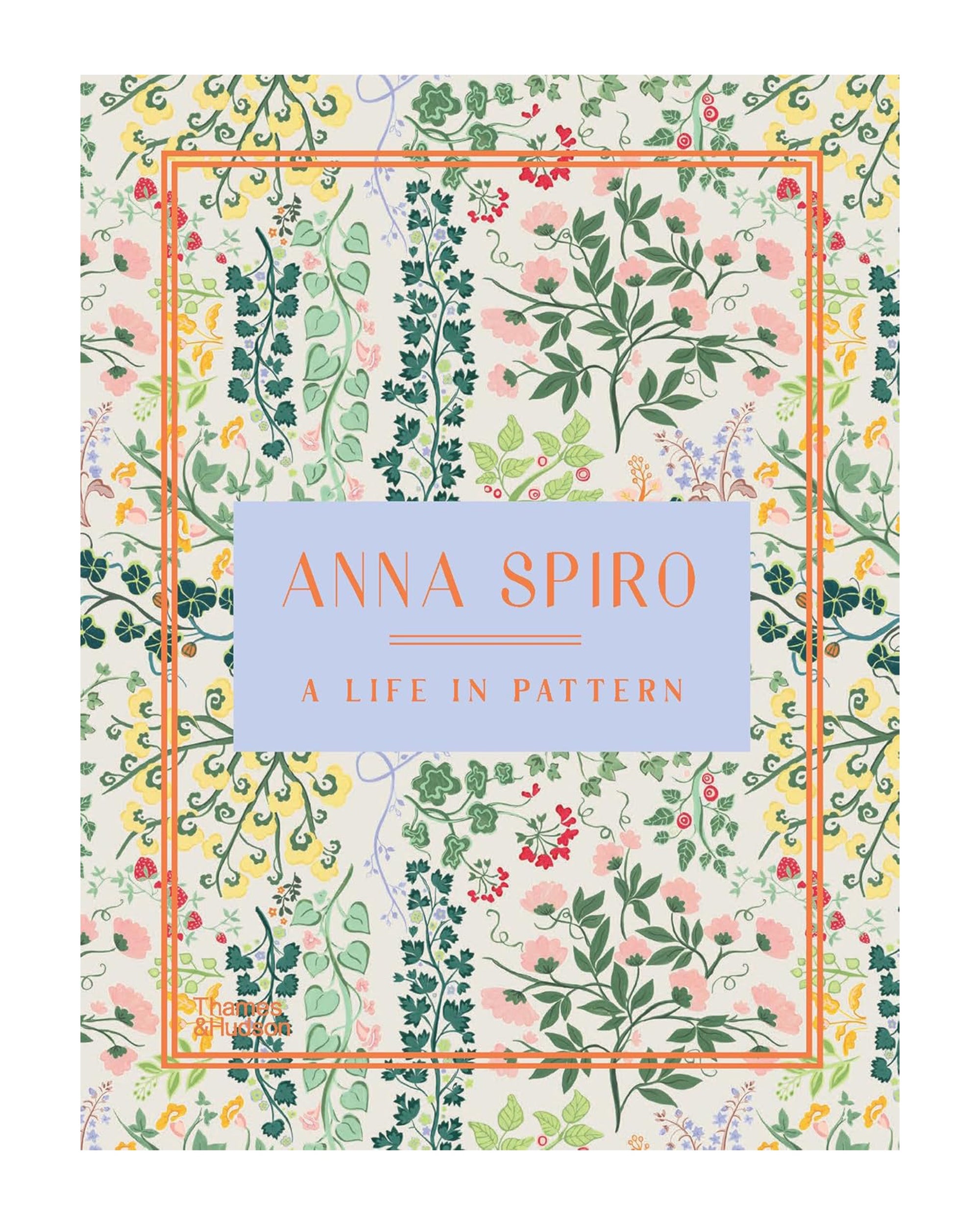 Book cover features a vibrant floral pattern and ornate border, echoing Anna Spiro’s style. Centered is a blue box with "Anna Spiro" in orange and "A Life in Pattern" in gold. W.W. Norton & Co. appears in the lower left corner.