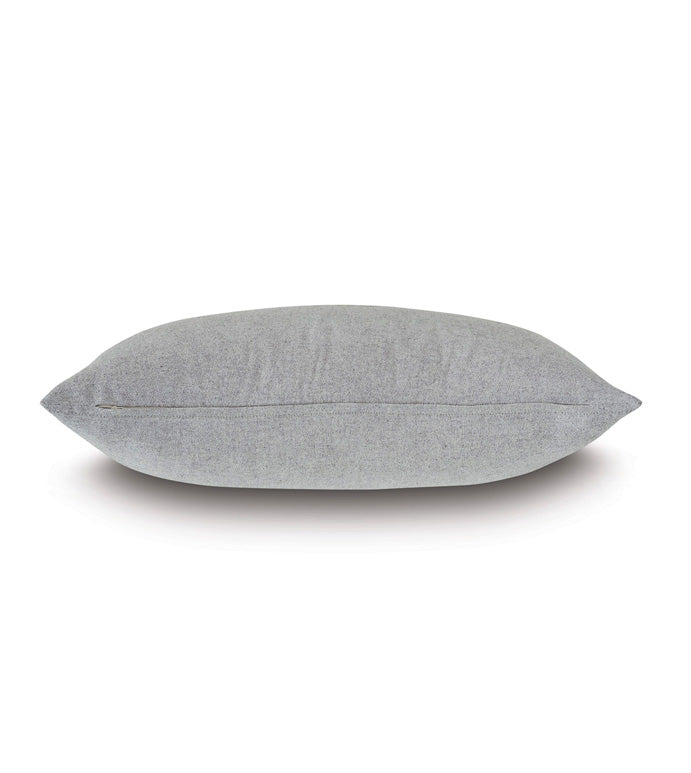 The Sprouse Linear Pillow by Eastern Accents is shown in side profile against a white background. The pillow looks soft and evenly filled, featuring a smooth fabric surface and slightly pointed ends.