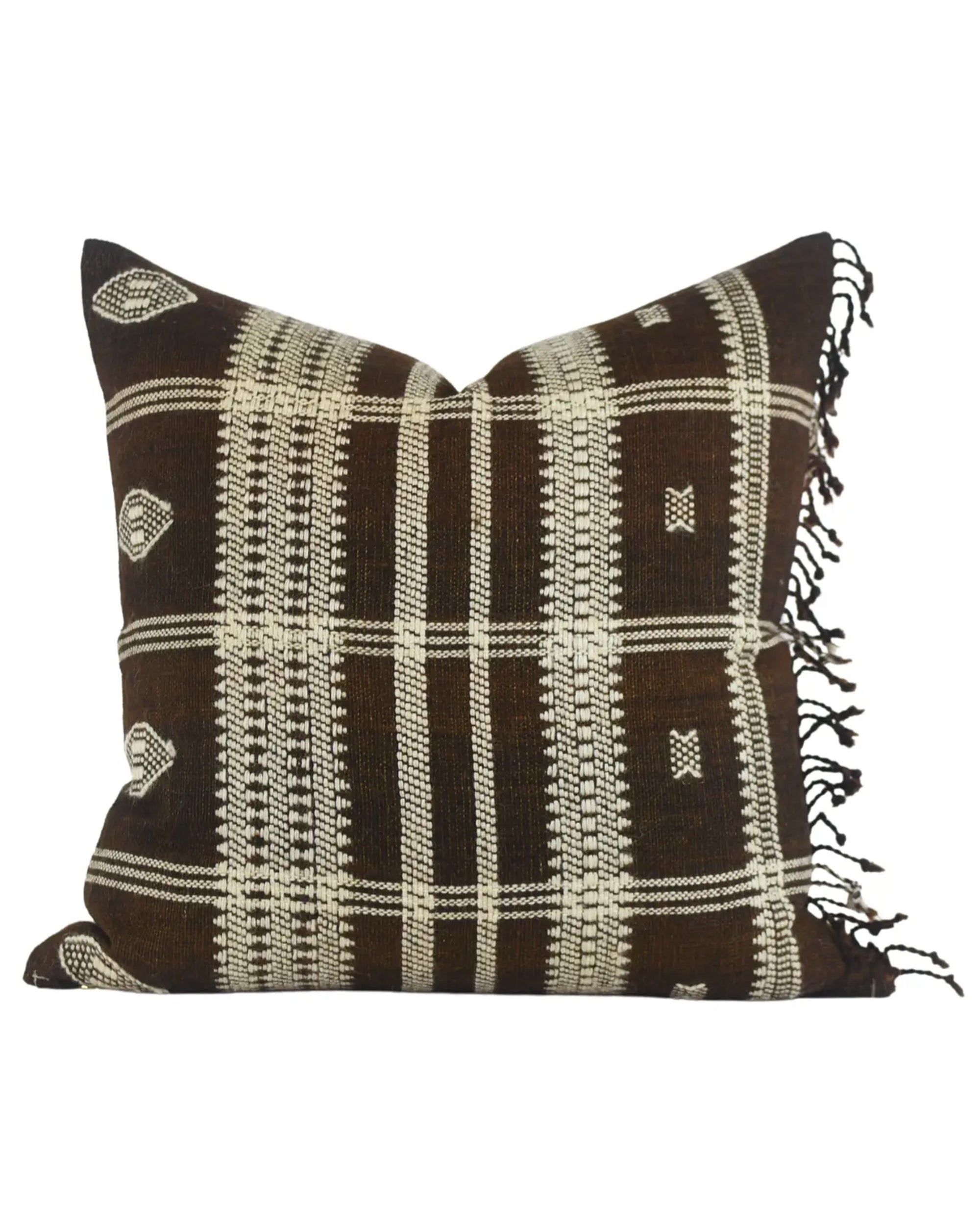The Aruna Fringe Pillow 22x22 by Faire is a handwoven wool cover featuring brown and cream geometric patterns, black fringe tassels on the right, and design elements inspired by Gujarat, India craftsmanship.