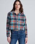 ASKK Crosby Hudson Plaid cropped flannel shirt in red and blue with blue jeans, casual style, light background.