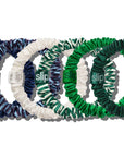 Six Faire Hair On Point Skinny Scrunchies w/ Pouch in navy, white, blue/white pattern, green/white pattern, and dark green protect against breakage and add style—each arranged in a row and featuring a branded tag.