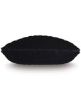 A black, oval-shaped PARK AVE FAUX FUR pillow by Eastern Accents is displayed on a white background. Its plush texture and channeled faux fur design create a luxurious look for any space.