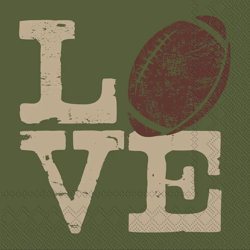 The Boston Cocktail Napkins by Faire feature the word "LOVE," with a brown football as the "O" on a green textured background and distressed cream letters—perfect for parties.