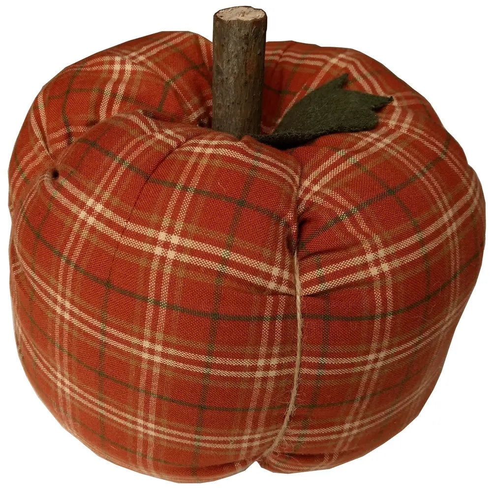 The Faire Pumpkin is an autumn ornament shaped like a pumpkin, featuring red plaid fabric, a brown stem, and a green felt leaf—ideal for cozy farmhouse decor.