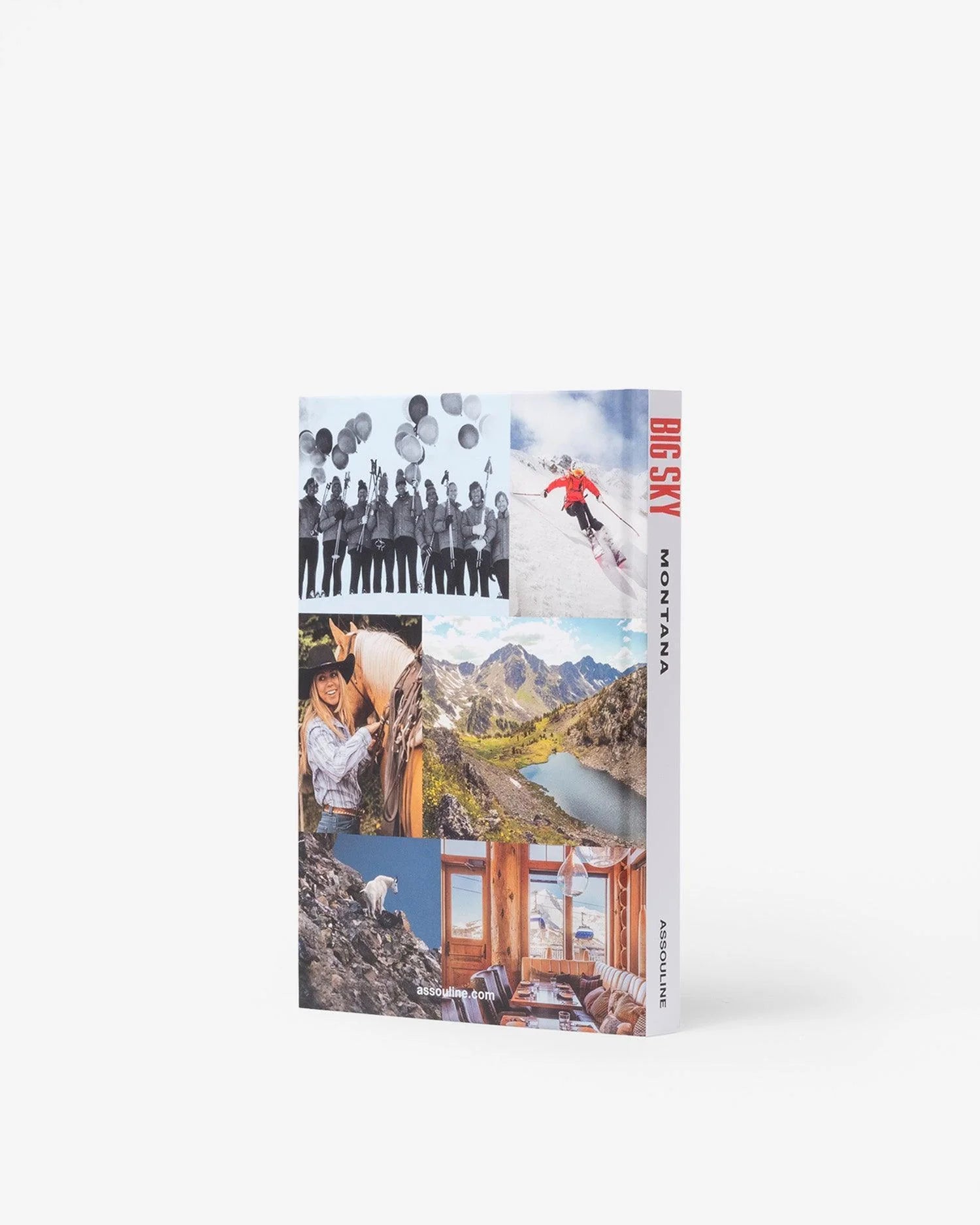 A hardcover book named "Big Sky" by Assouline captures the essence of outdoor enthusiasts with a cover collage featuring a band with balloons, a skier, someone on horseback, a mountain lake, and a cozy cabin interior.