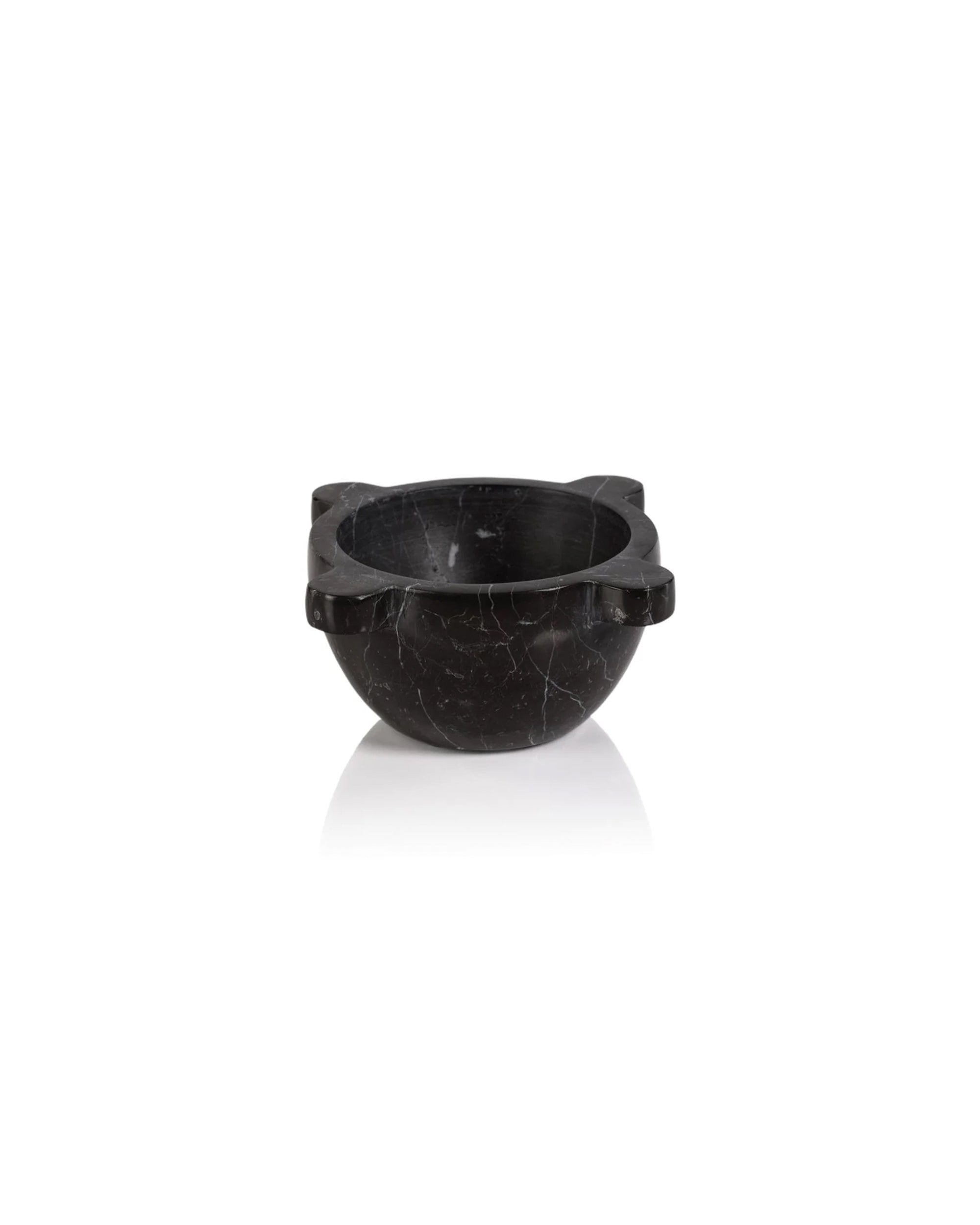 The Zodax IN-7913 Roma Mortar Bowl is a round black marble bowl with three small rectangular handles, ideal for grinding herbs and spices, shown against a white background.
