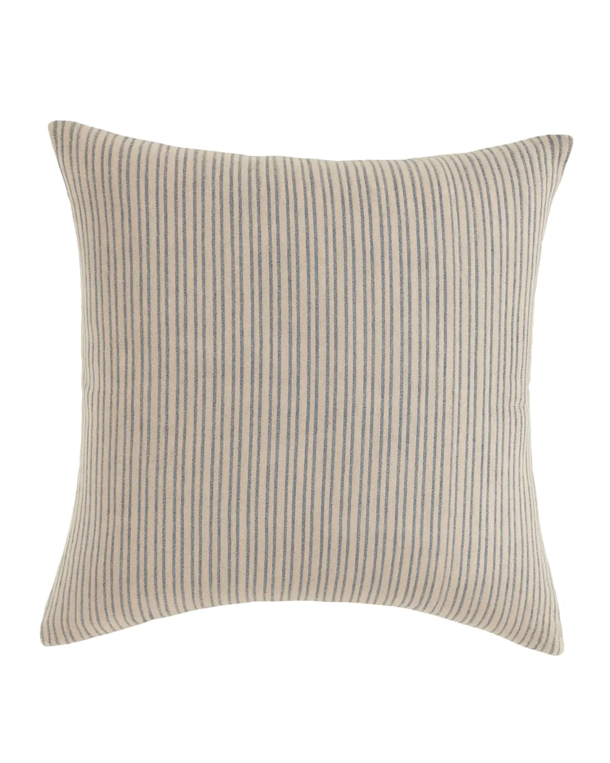 The Liam & Lana Wren Blue Pillow 24x24 features a beige background with thin blue vertical stripes and outward-curved edges, giving this decorative throw pillow a soft, plush look.