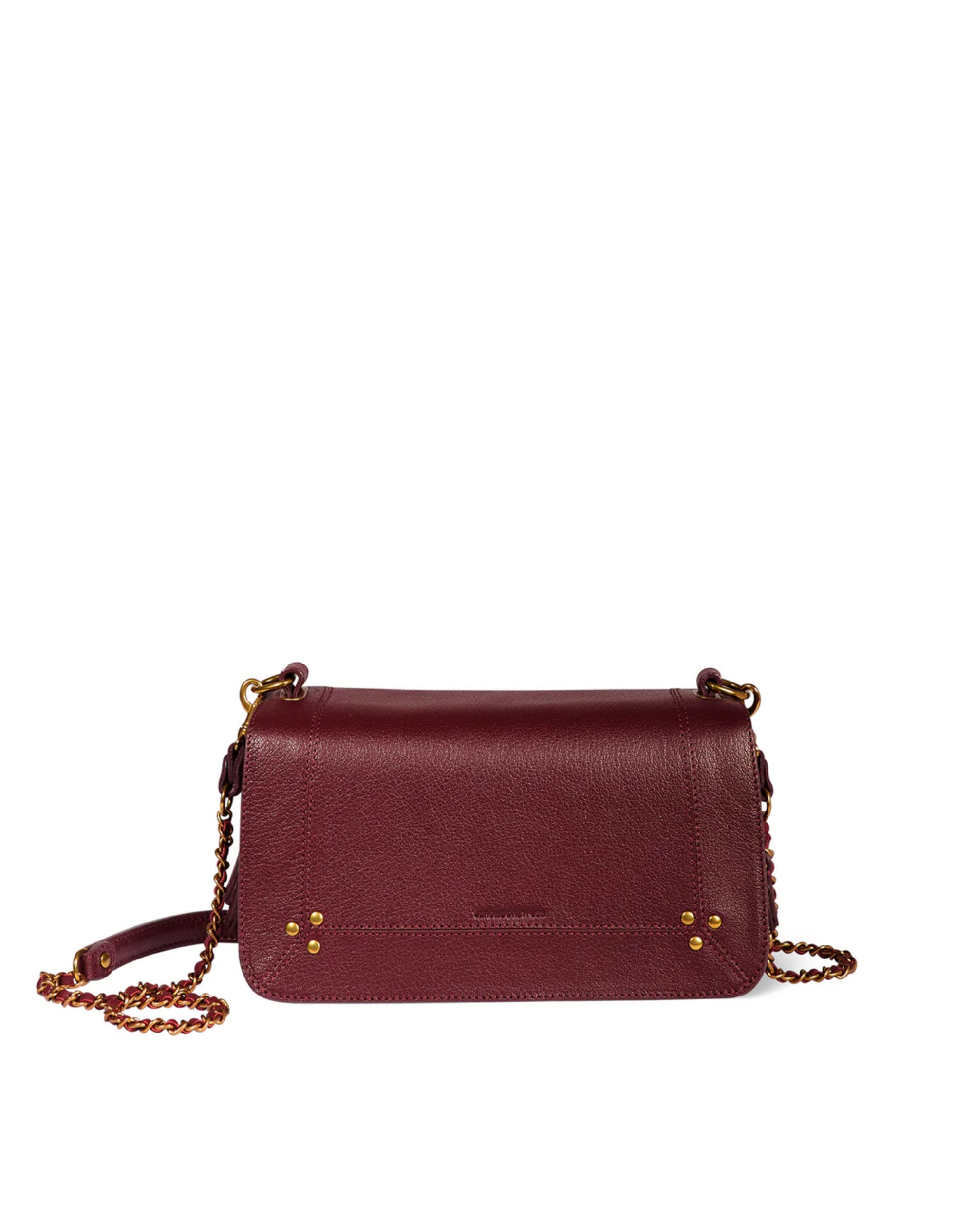 The Jerome Dreyfuss Bobi Bag, crafted in burgundy goatskin with a flap closure, gold-tone stud accents, and an adjustable chain strap, is displayed against a white background.