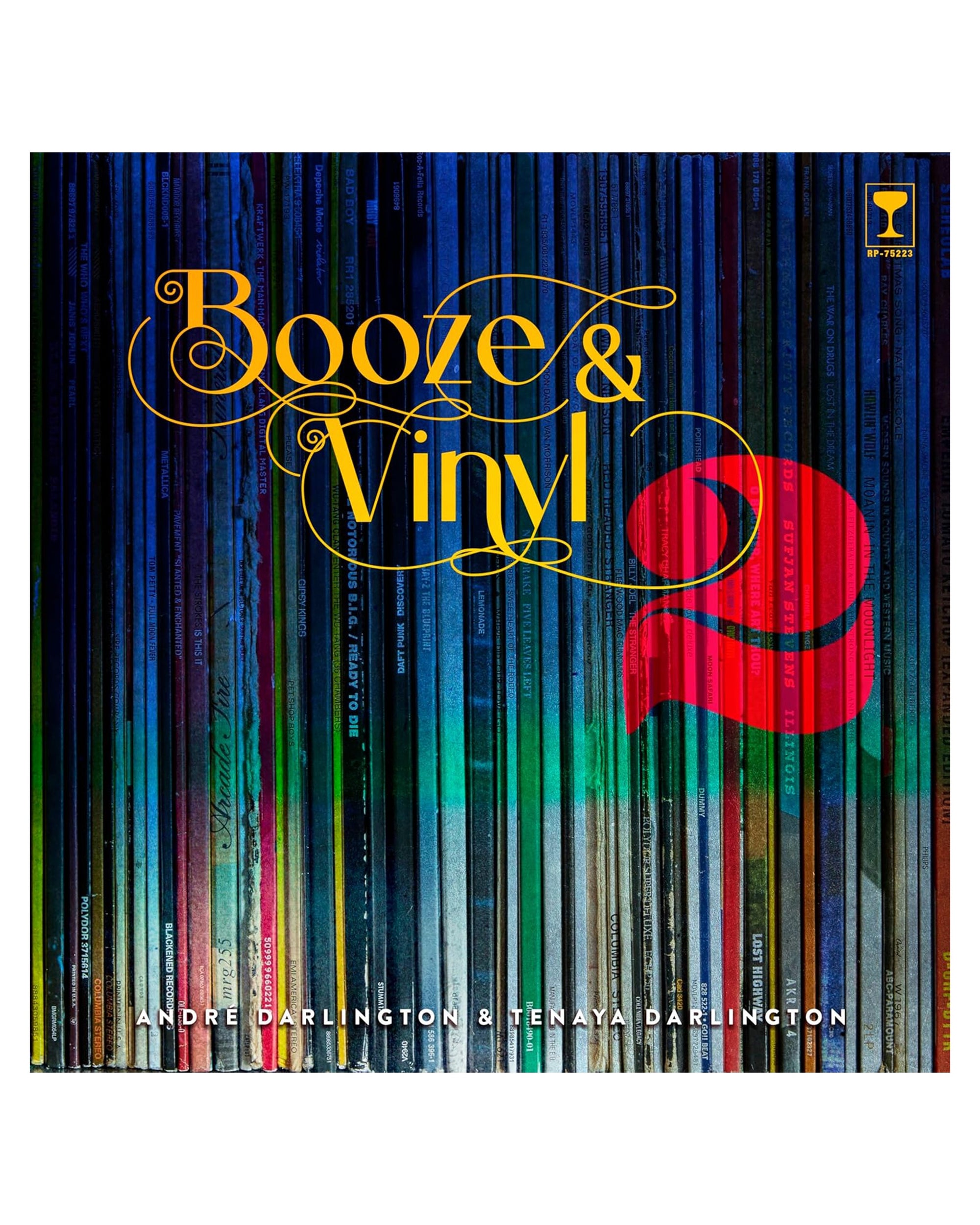 The cover of "Booze & Vinyl Vol. 2" by Hachette Book Group showcases rows of vibrant vinyl spines, ornate yellow script, and a bold red 2—ideal for any music cocktails fan or listening party host; authors’ names are at the bottom.