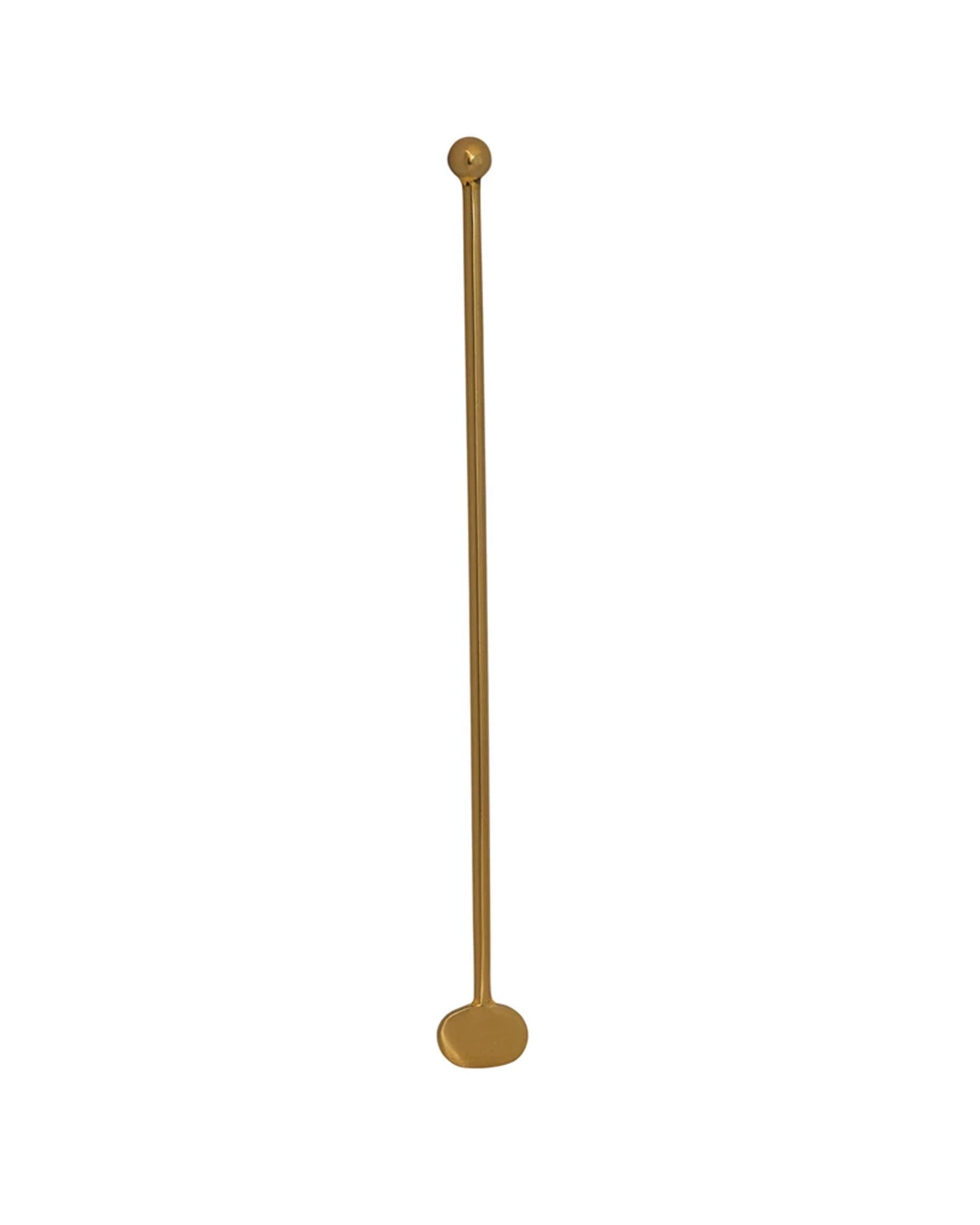 The Bloomingville Cocktail Stirrer Antique Brass features a round ball on one end and a flat, rounded paddle on the other—a stylish metal bar accessory for mixing drinks, shown against a white background.