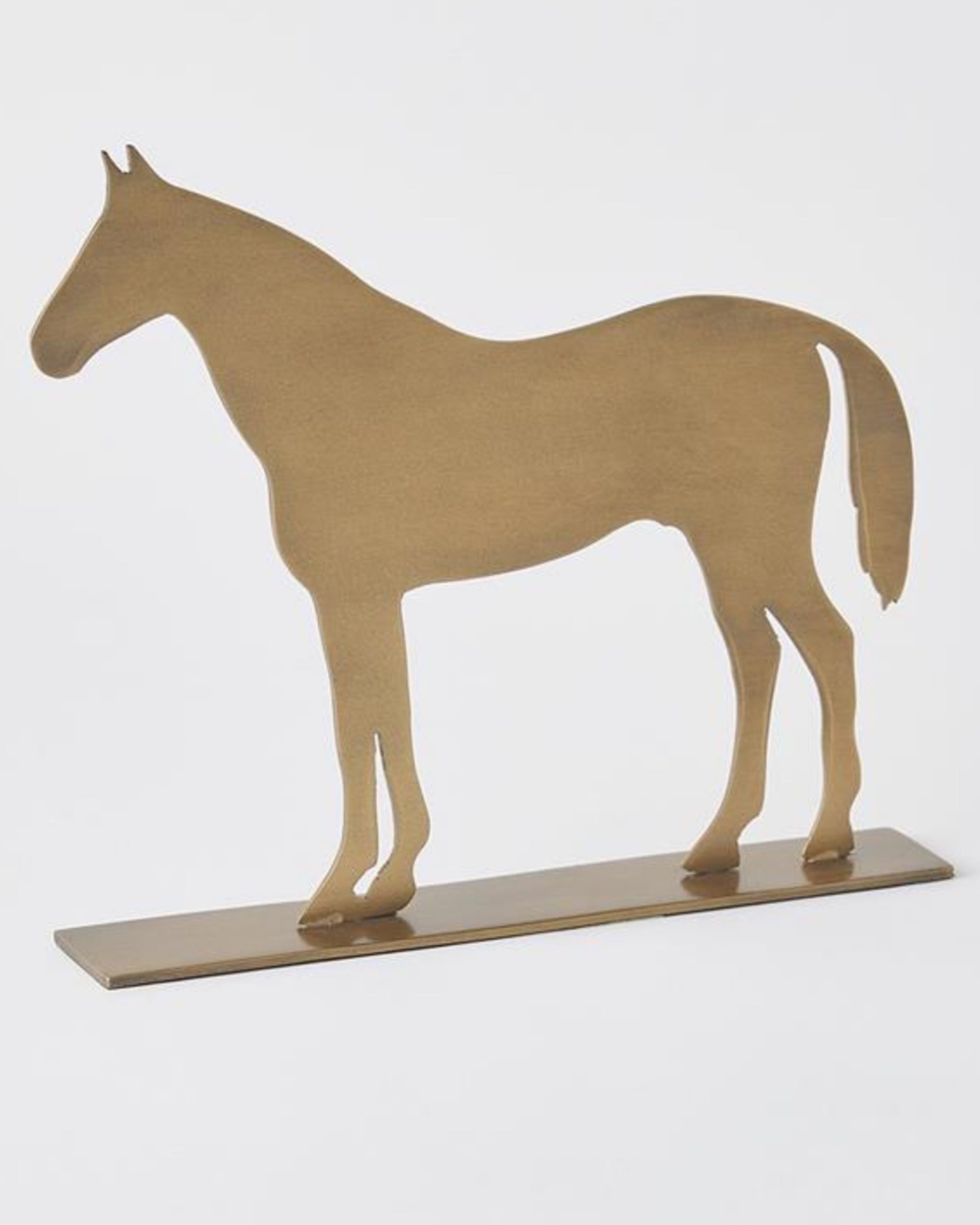 The Global Views Brass Horse Sculpture features a handcrafted iron design with an elegant antique brass finish, minimal detailing, and stands on a rectangular base against a plain white background.