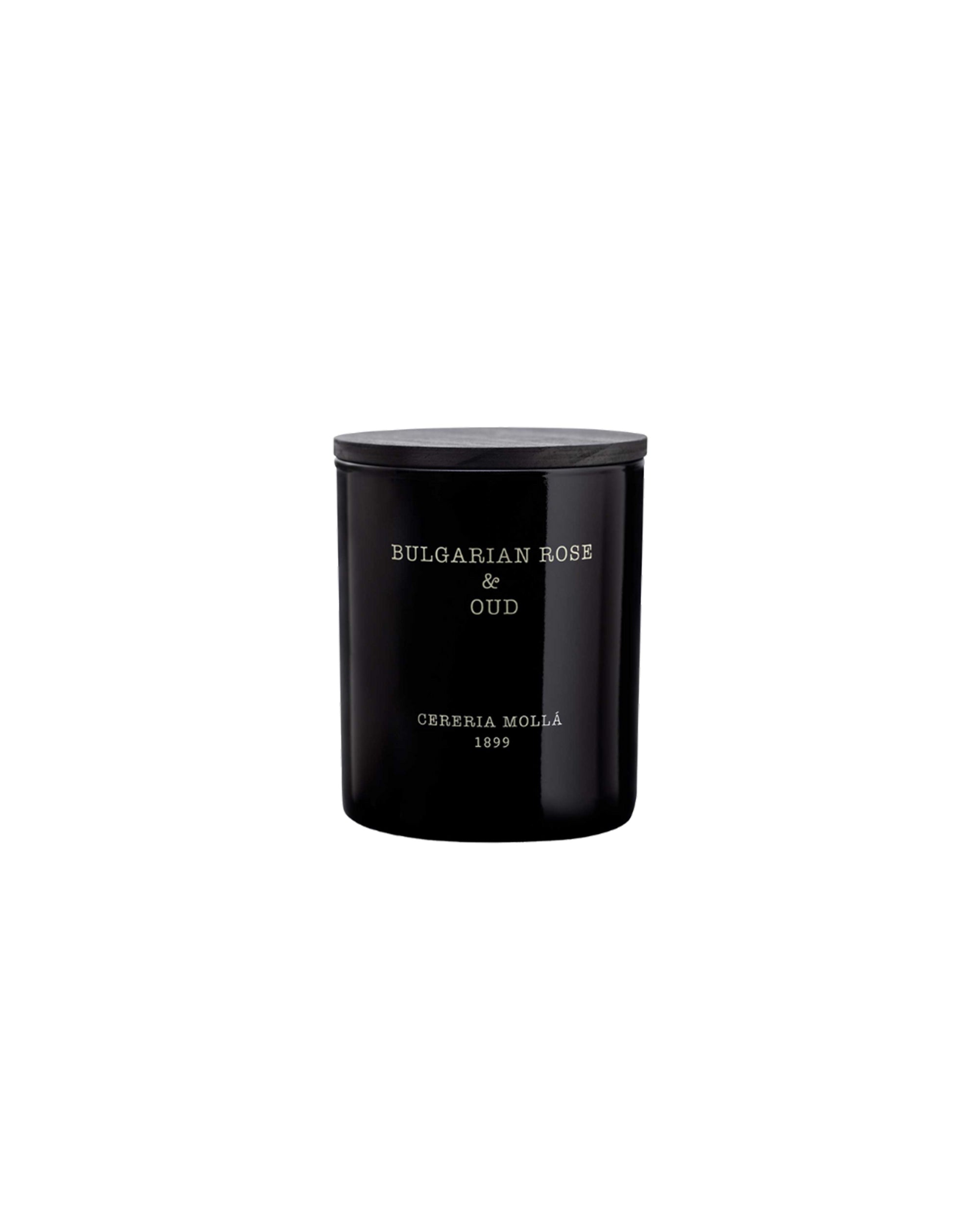 A black soy wax candle jar labeled "Bulgarian Rose & Oud" from Cereria Molla sits centered against a plain white background—an ideal pick for scented candle enthusiasts.