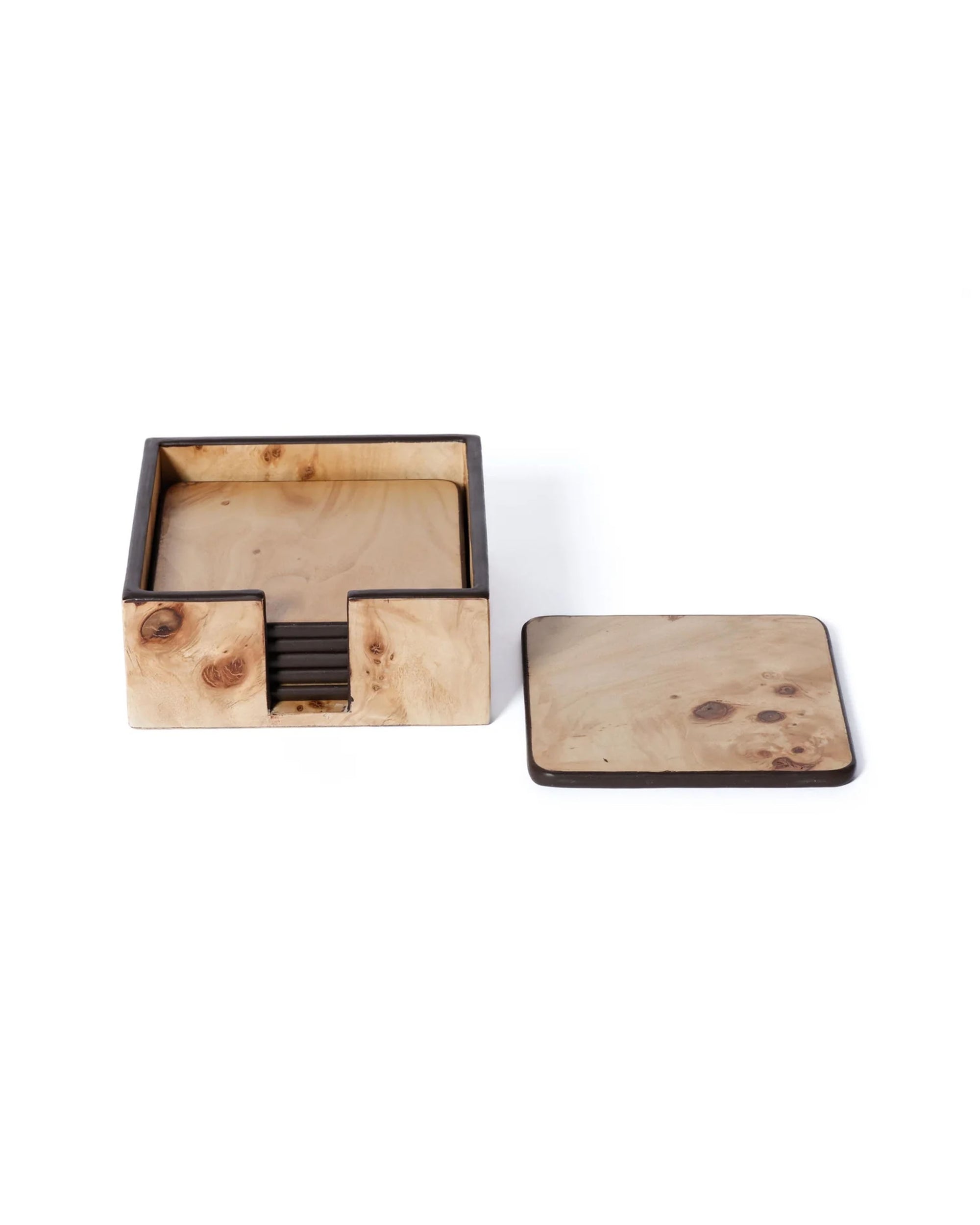 The Zodax Valberg Burl Coaster Set features a square holder with several light wood coasters inside, plus one displayed outside, all showing the natural grain patterns of burl veneer.