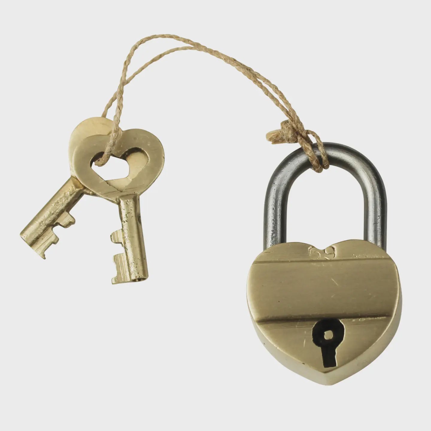 The HomArt Heart Lock Brass is a solid brass lock with two matching keys featuring heart-shaped cutouts, tied to the padlock with twine, ideal for wedding party favors.