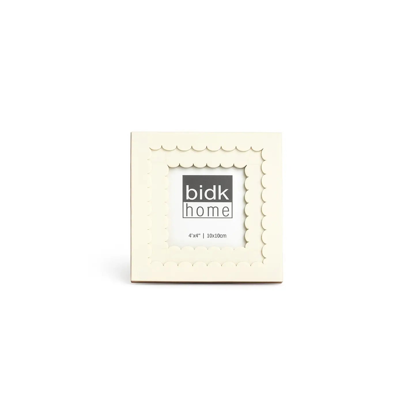 The BIDK Home 4x4 Floral Resin Frame features a square, cream design with a scalloped edge and &quot;4x4” | 10x10cm&quot; insert, adding elegant decor to any space.