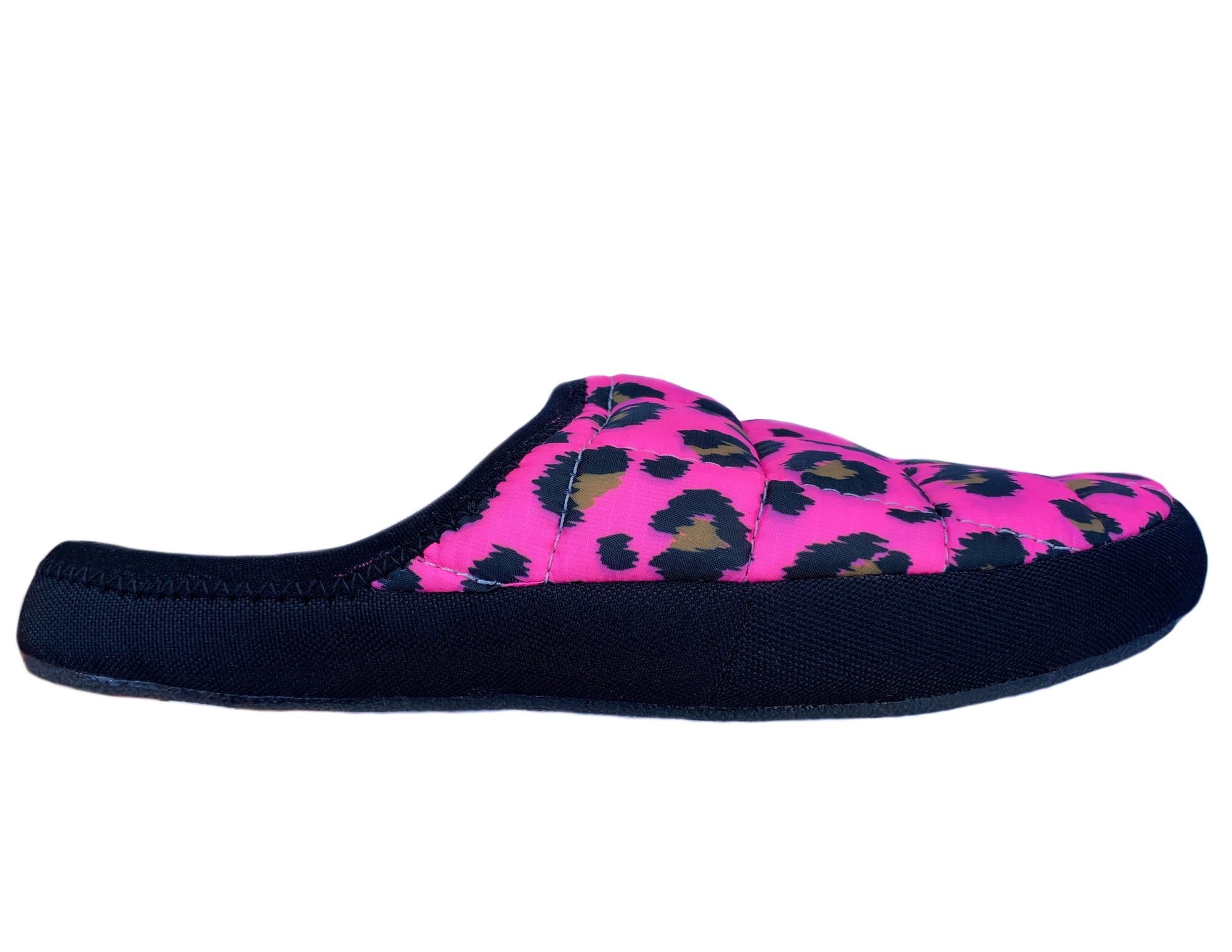 The Faire Coma Toes are slip-on lounge slippers featuring a thick black sole and a bright pink quilted upper with a bold black and yellow leopard print, inspired by cozy puffy coat designs.