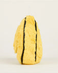 The Faire Smiley Face Warmies Junior is a microwavable plush toy shaped like a yellow oval with two black stripes. Soft and fuzzy, it offers sensory comfort and stands upright with no visible face, photographed against a plain light background.