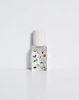 Maison Matine Perfume by Faire sits against a plain white background, its bottle evoking playful vibes inspired by vanilla and musk.