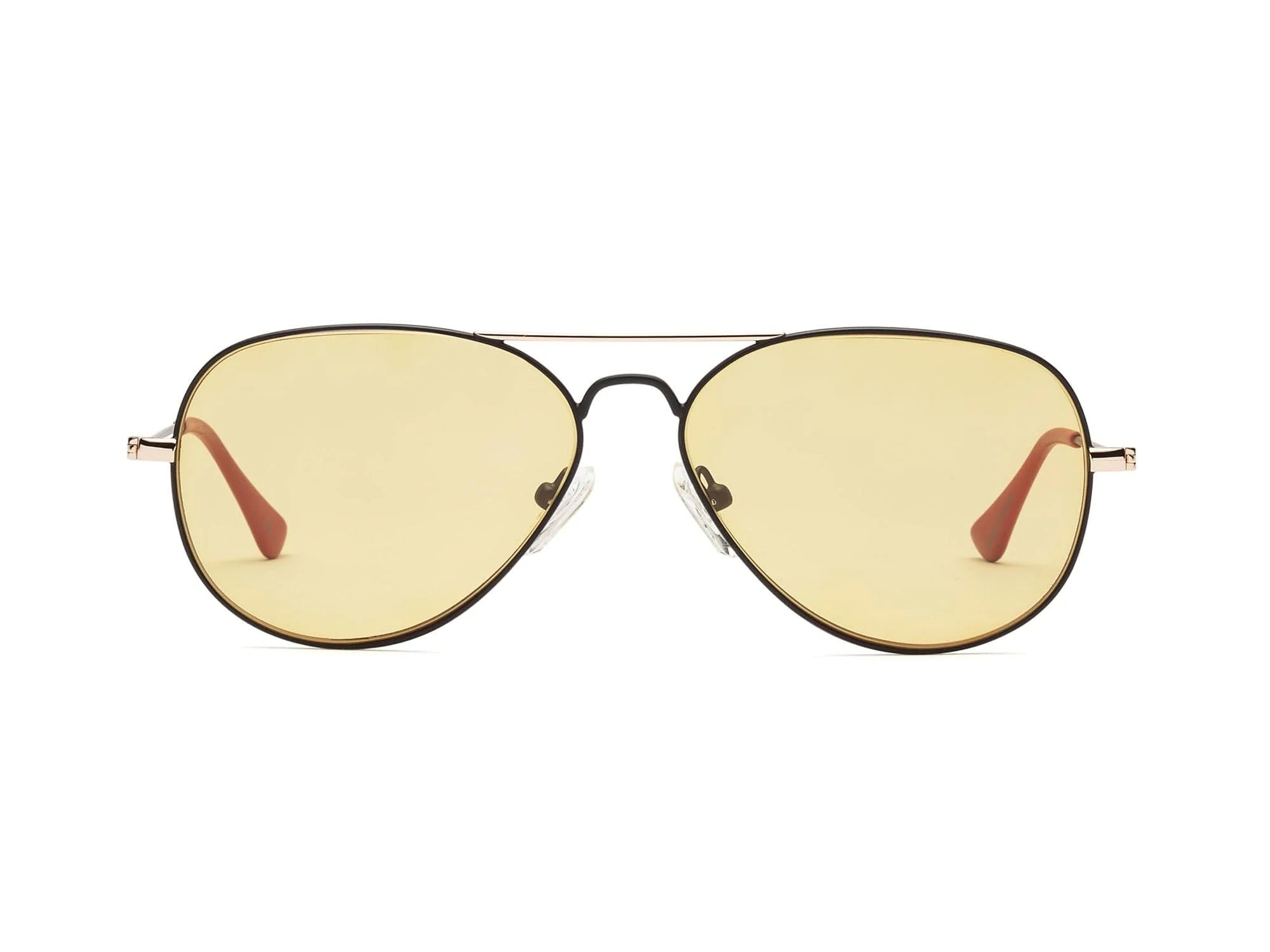 The Caddis Mabuhay Matte Black features wire frame aviator sunglasses with gold-color tinted lenses and red rubber temple tips, shown against a white background.