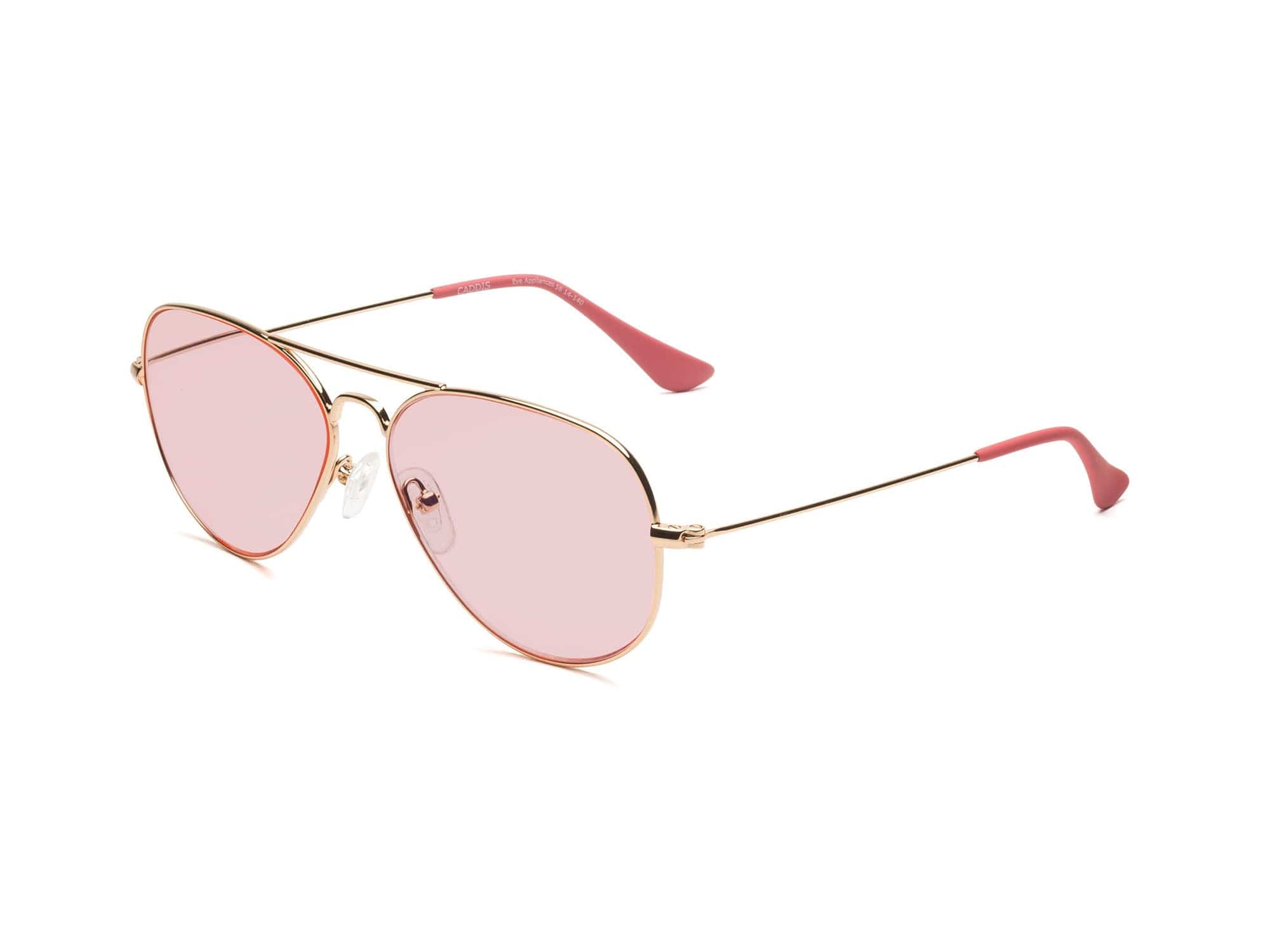 The Caddis Mabuhay Polished Gold aviator sunglasses feature pink-tinted lenses and matching rubber temple tips, shown on a white background.