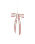 The Candace Ornament 5x9.5" by Accent Decor is a white decorative topper with red stripes and two long tails, hanging by a thin red string against a plain white background.