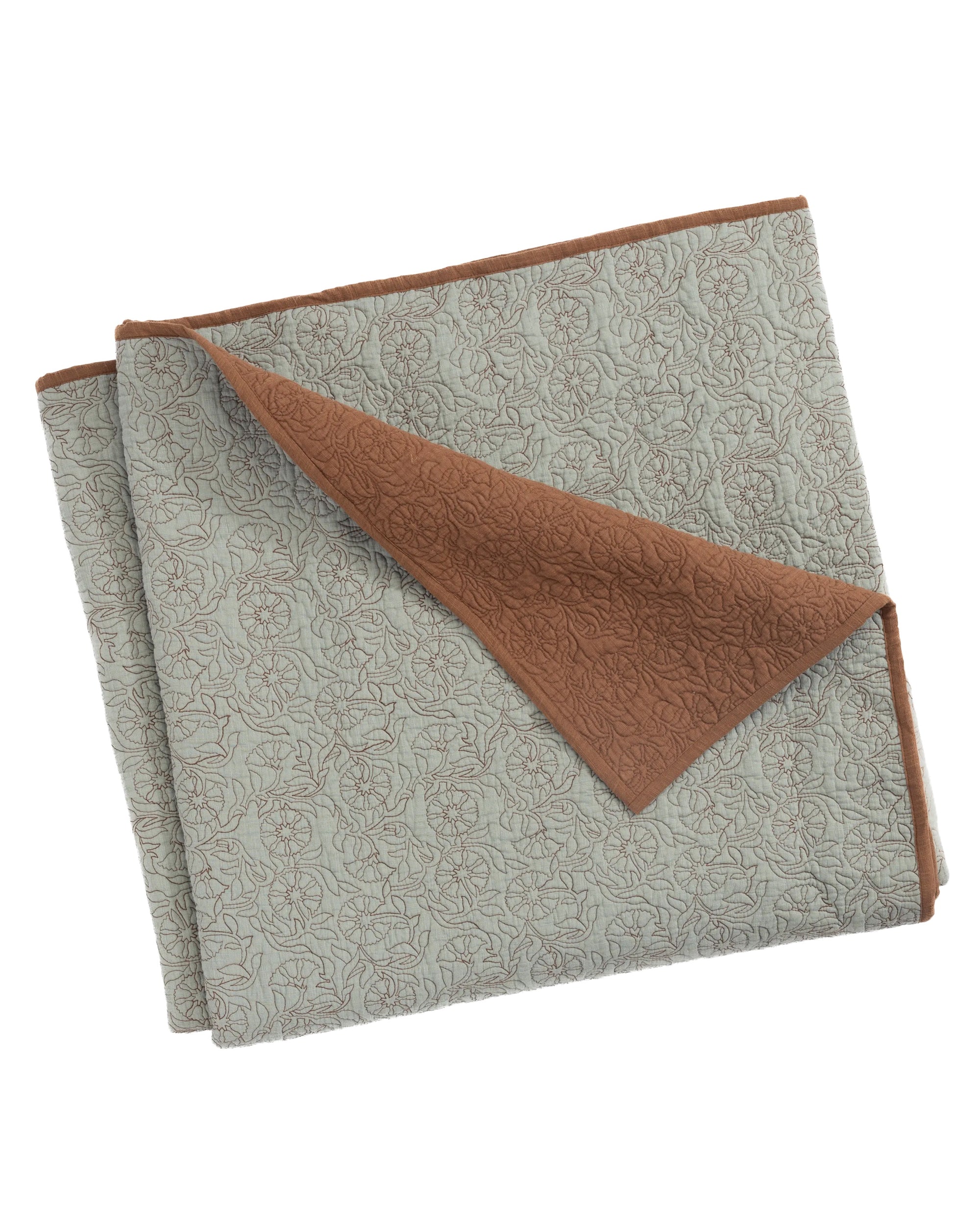 The Caroline Quilt Queen by Amity Home is a reversible cotton quilt with a light grey patterned side, solid brown underside, subtle stitched designs, and a block-print motif.