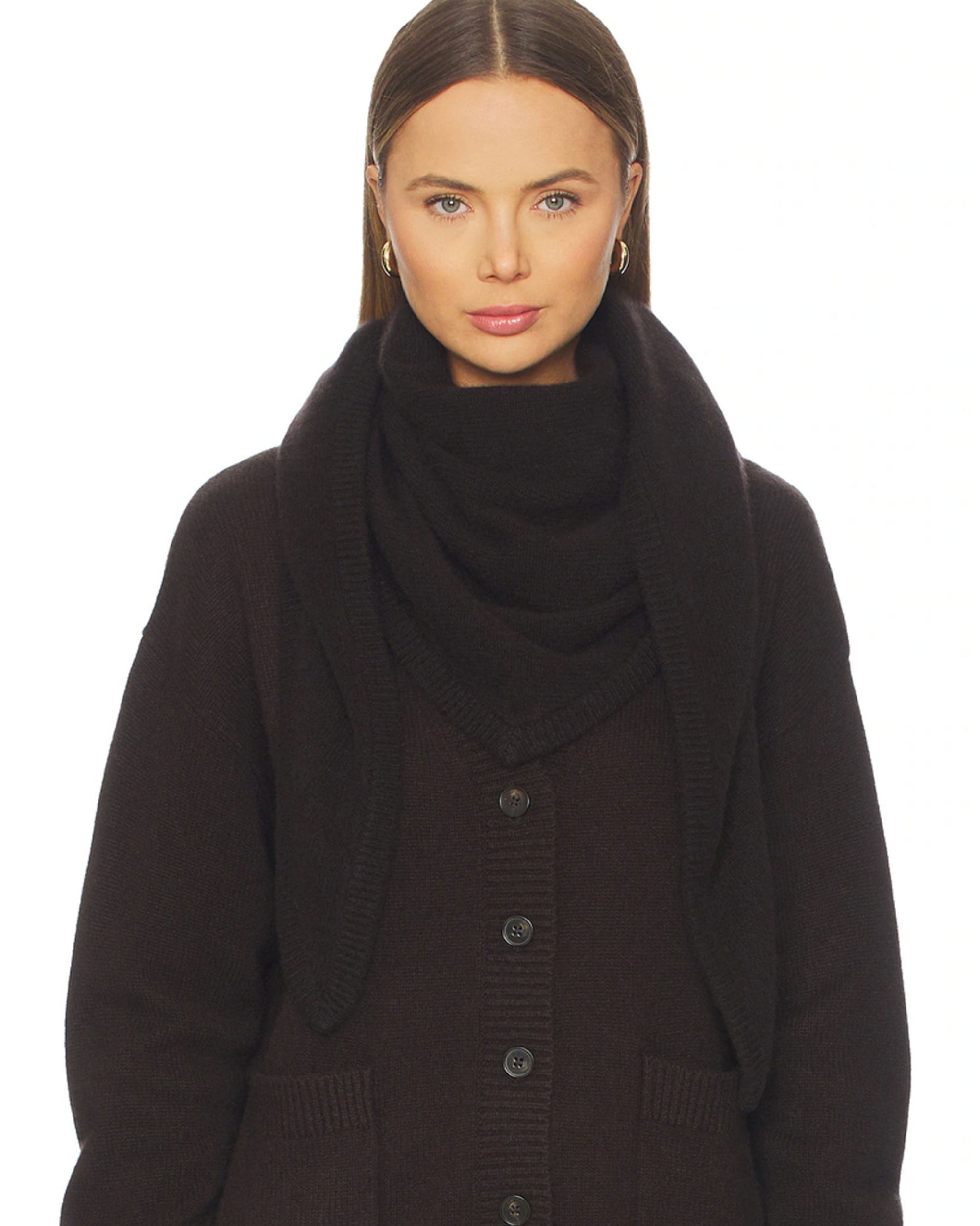 A woman with straight brown hair wears the White + Warren Cashmere Blend Triangle Scarf in dark brown, paired with a matching buttoned cardigan. She faces forward with a neutral expression against a plain white background.
