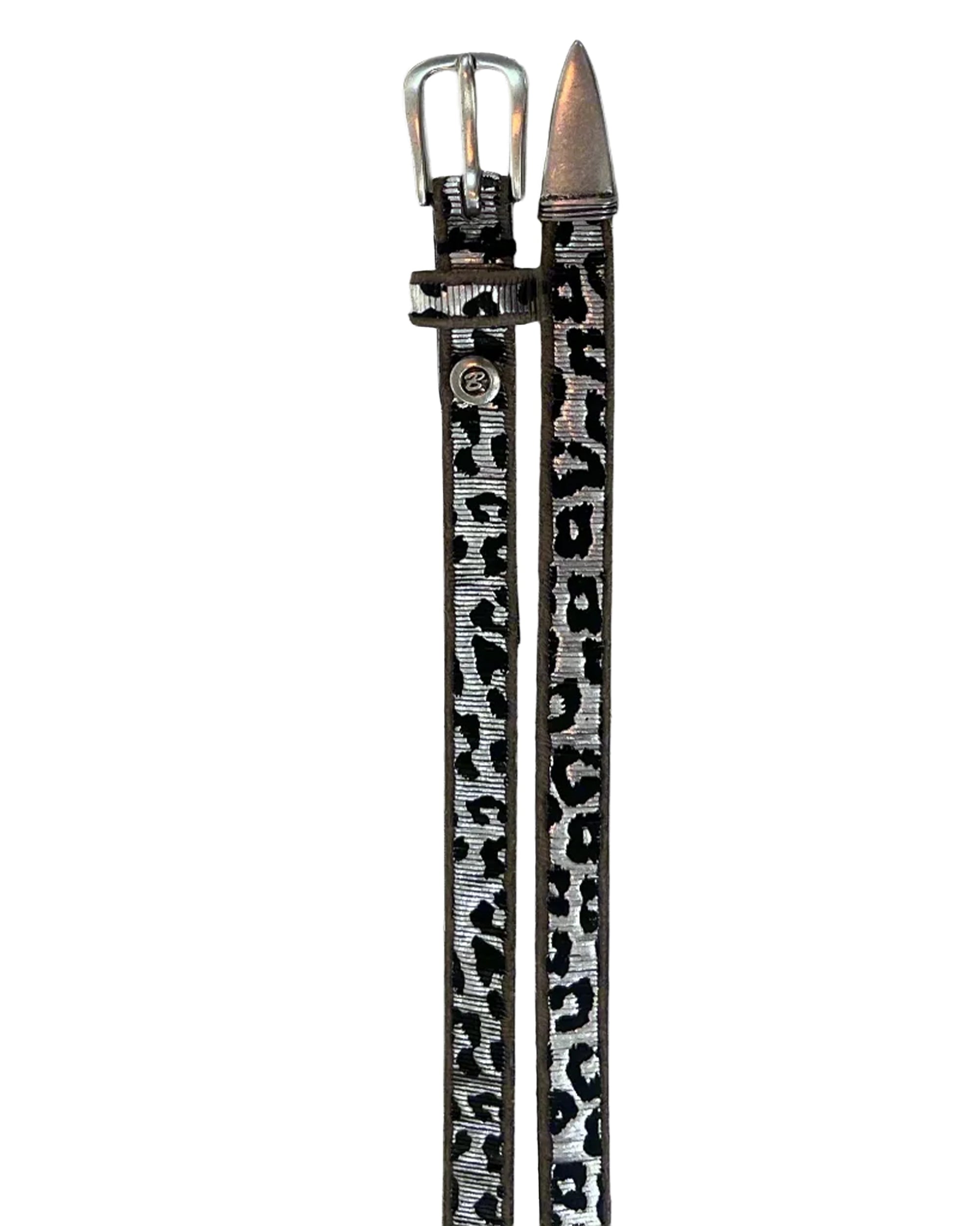 The Cathleen Belt by ICO Sportswear Ltd. is a thin leather accessory with a black, white, and gray leopard print, handmade in Germany, featuring a silver buckle and pointed metal tip.