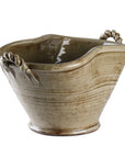 The Zentique Grey Ceramic Pot features a glazed finish, flared rim, and two twisted handles on each side. Its tan-grey ceramic surface displays a slightly uneven, rustic texture, shown against a white background.