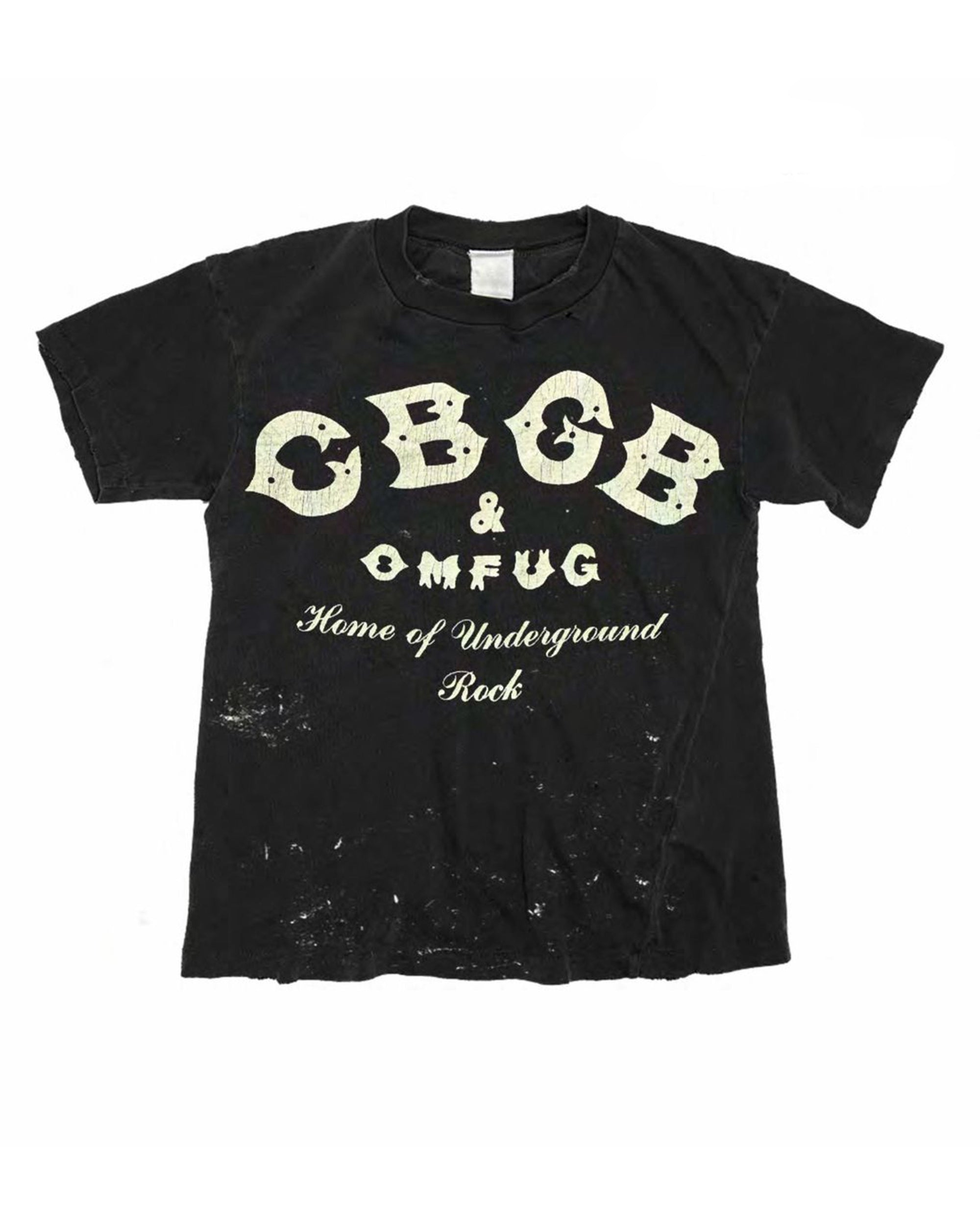 The Made Worn CBGB Crop Tee features a worn, faded black finish with "CBGB &amp; OMFUG Home of Underground Rock" in distressed white lettering and visible white stains near the bottom, creating a classic vintage look.