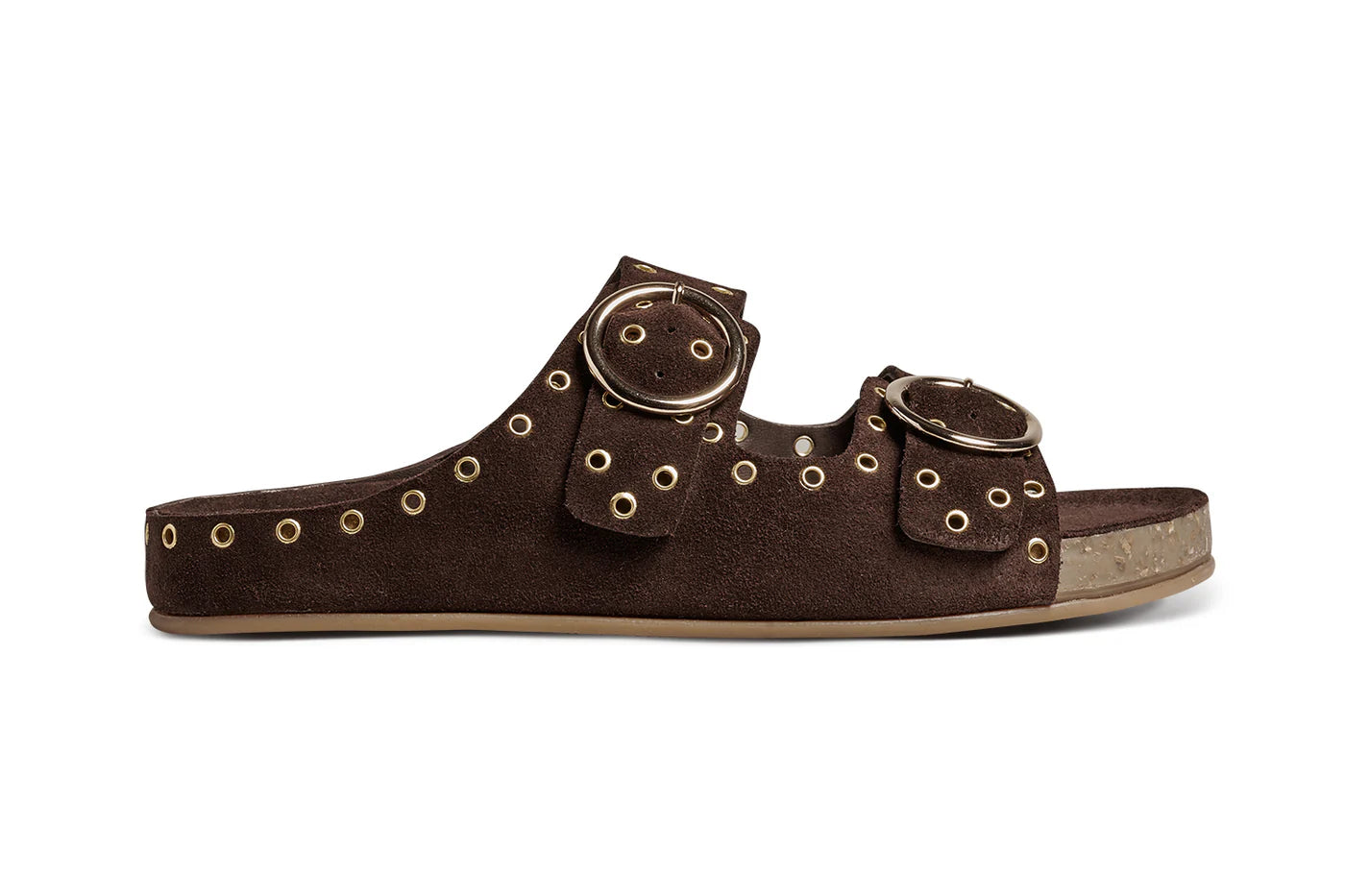The CEDAR by Beek is a brown suede slide sandal with arch support, two adjustable straps featuring gold eyelets and large round buckles, plus a comfortable cork footbed.