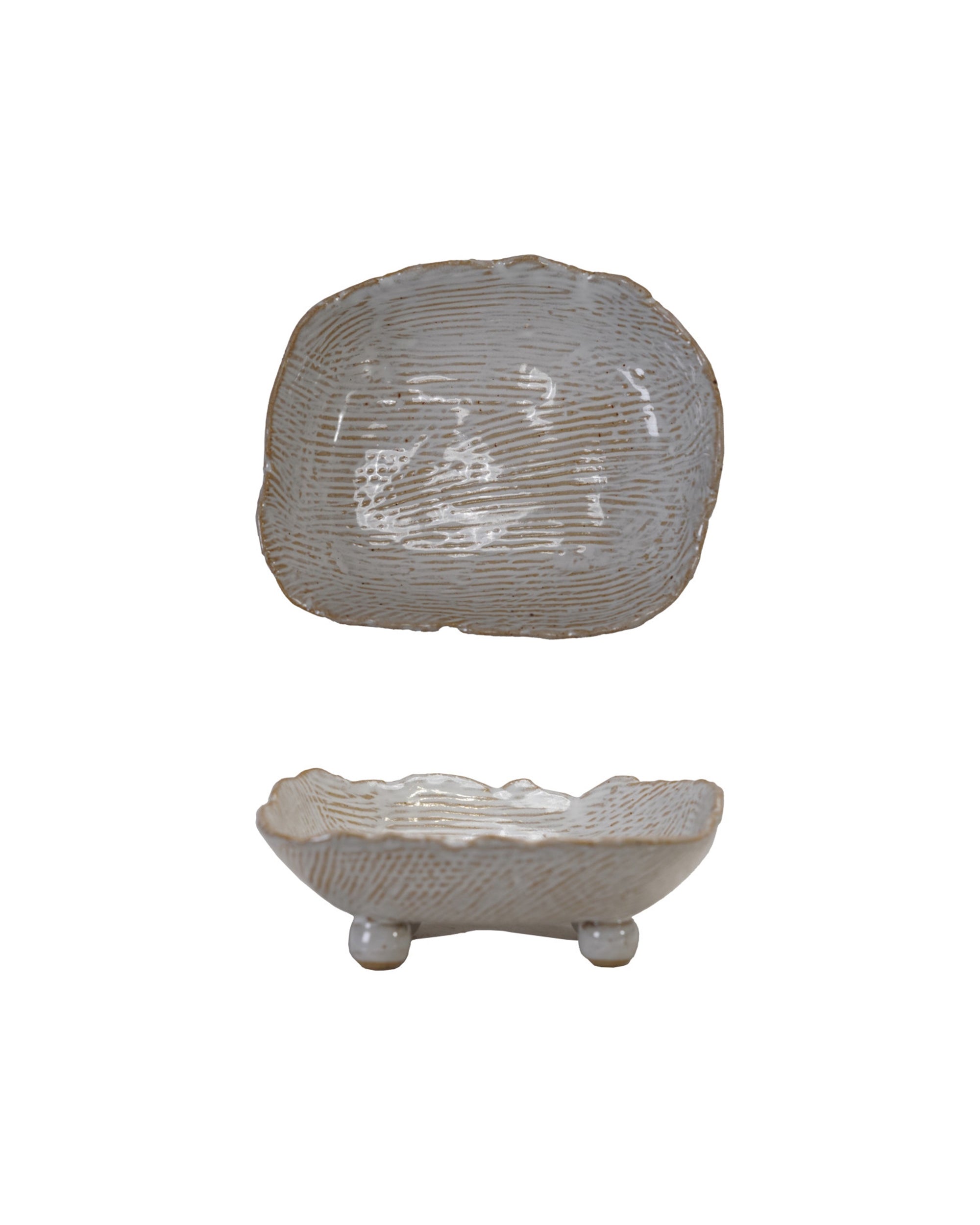 The Bloomingville Trinket Dish Tray/White is a stoneware piece with an organic, irregular rim, ribbed texture, reactive speckled white glaze, and three rounded feet. Shown from top and side views.