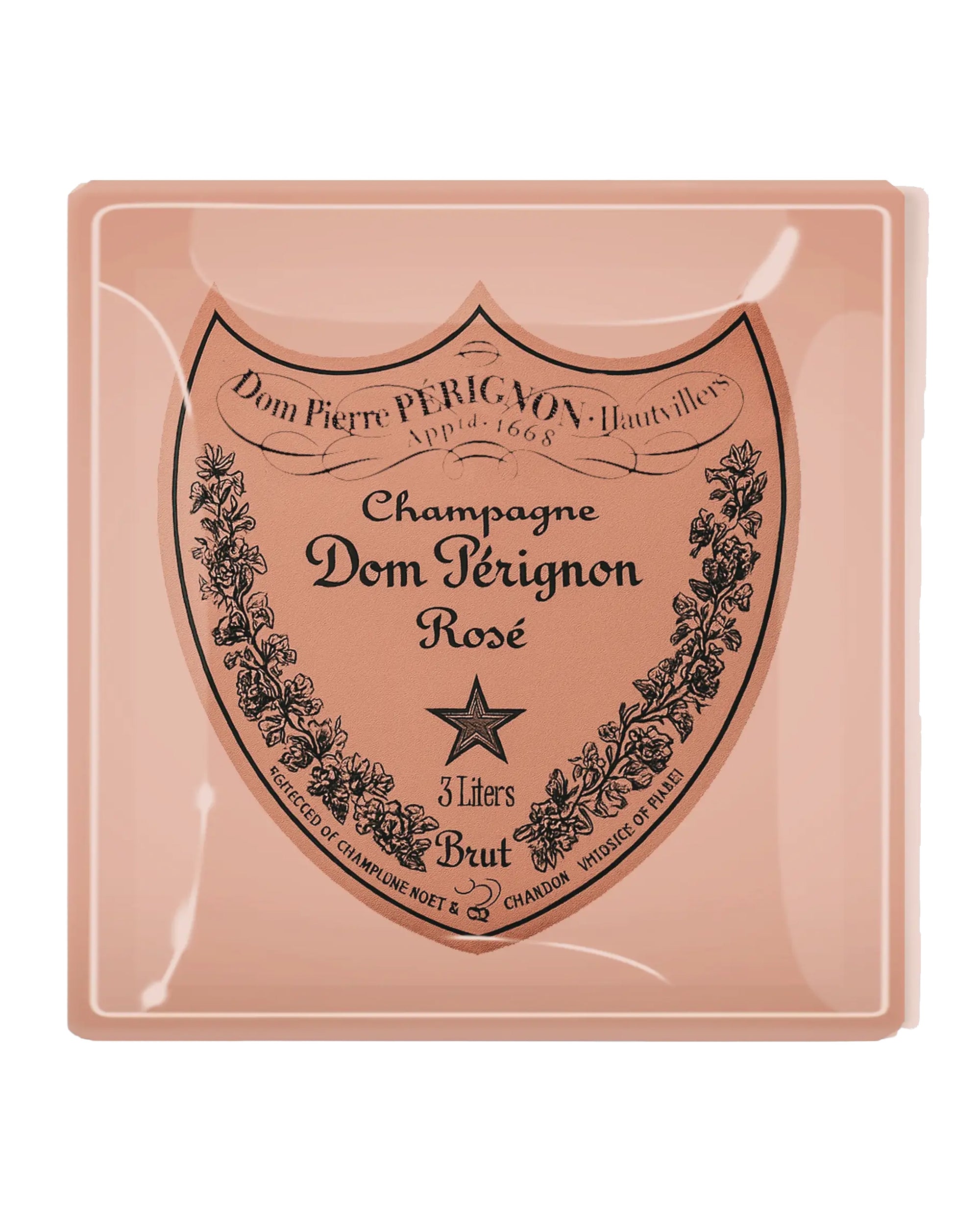 The Faire Dom Perignon Rose Glass Tray is a handcrafted piece featuring a large pink "Dom Pérignon Rosé, 3 Liters, Brut" label design with decorative flourishes and a central star.