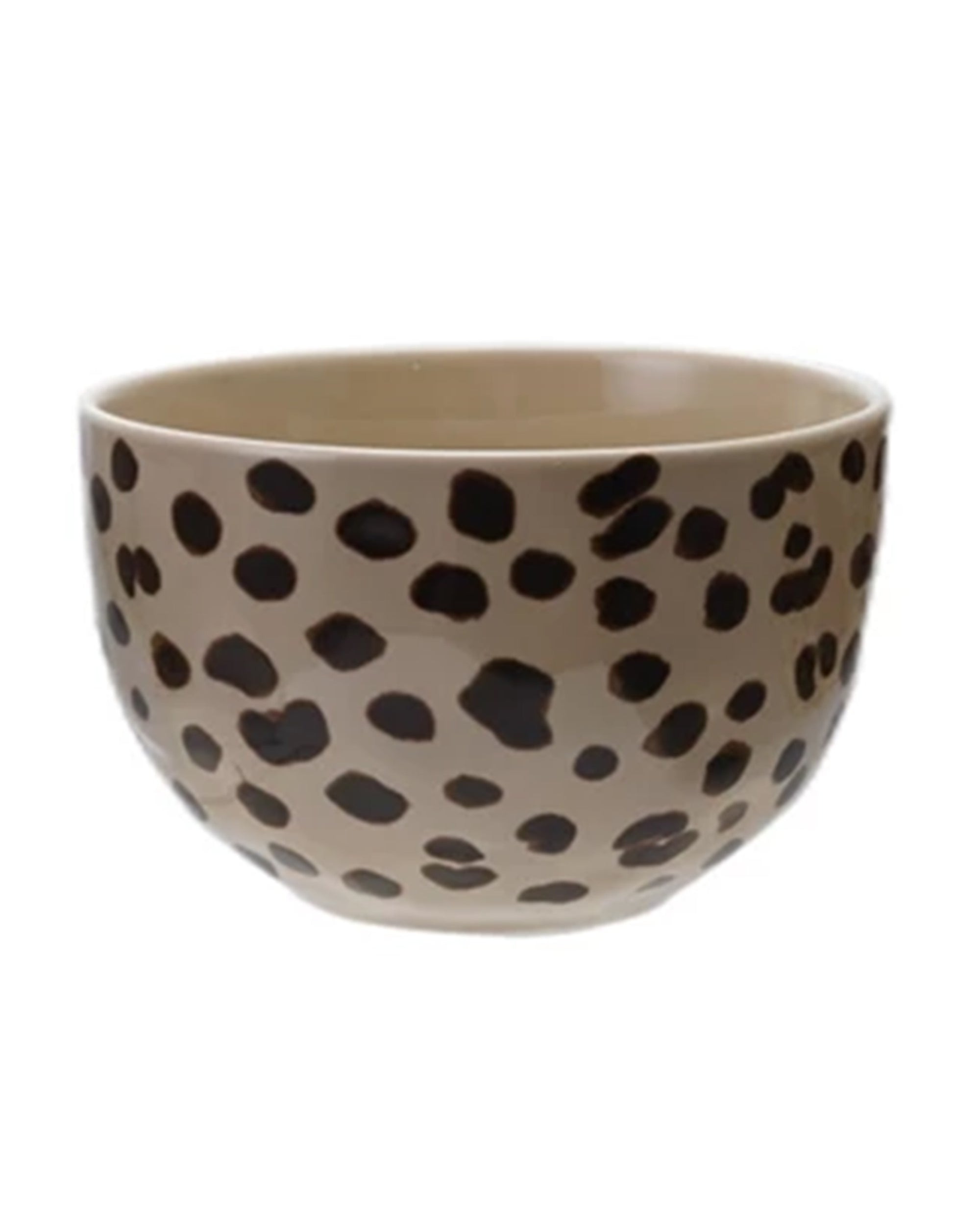 The Creative Co-op Bowl with Animal Print is a round beige stoneware bowl with irregular black leopard-like spots, perfect for serving small dishes. Shown against a plain white background.