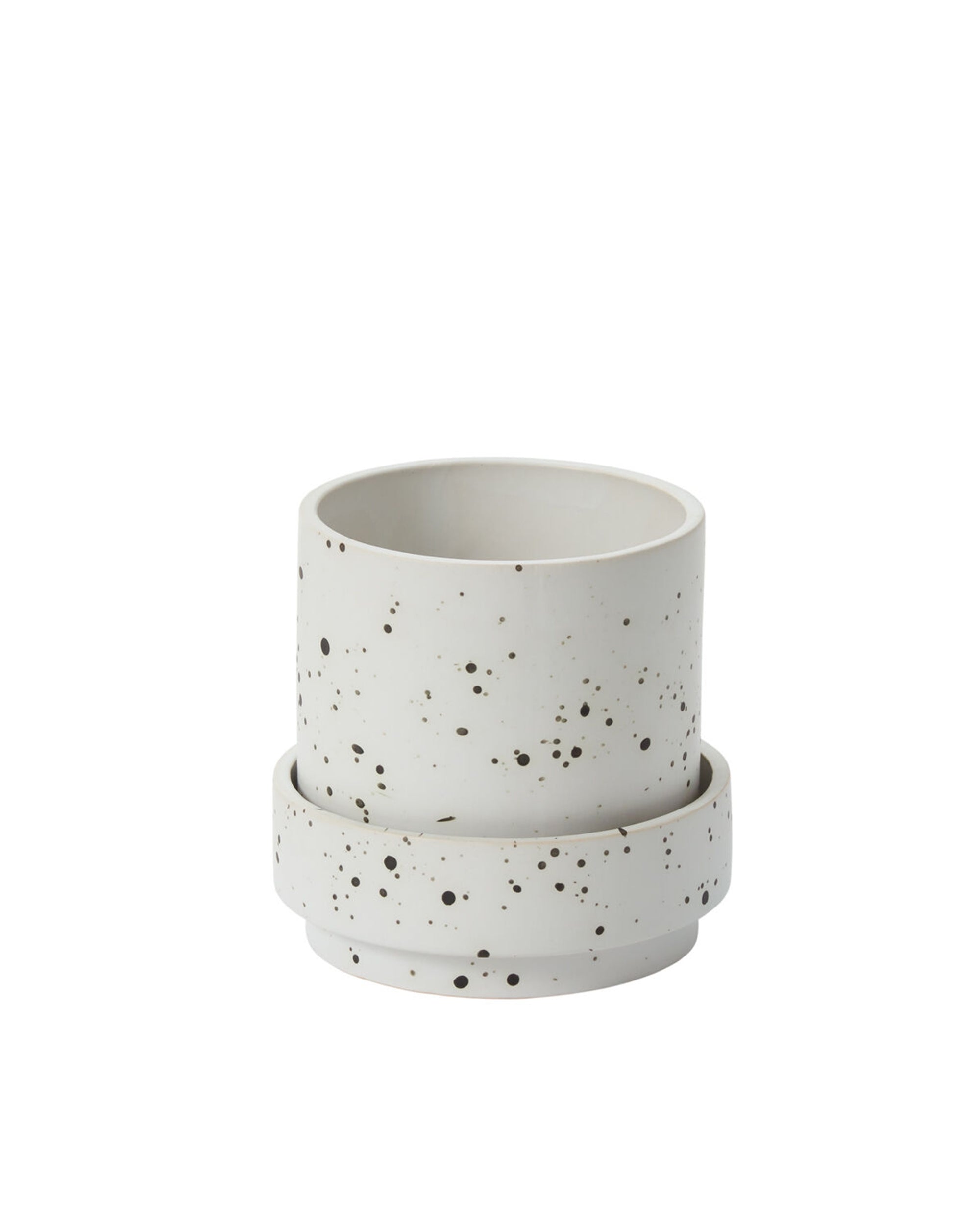 The Accent Decor 98785 Claxton Pot with Saucer S is a white ceramic planter with drainage, featuring black speckled spots and a minimalist cylindrical design for a modern touch.